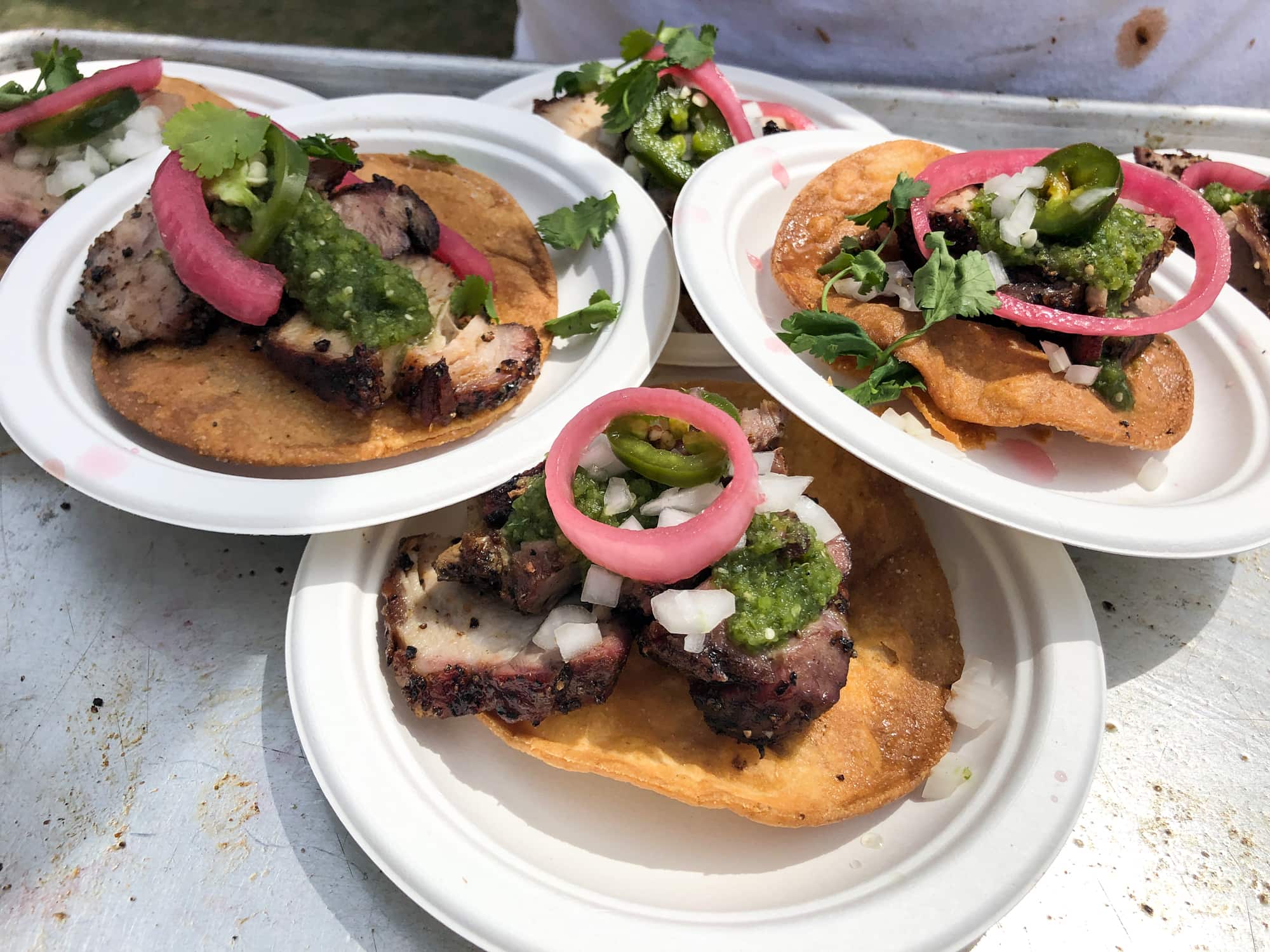 Beef tostadas with onion and chimichurri sauce