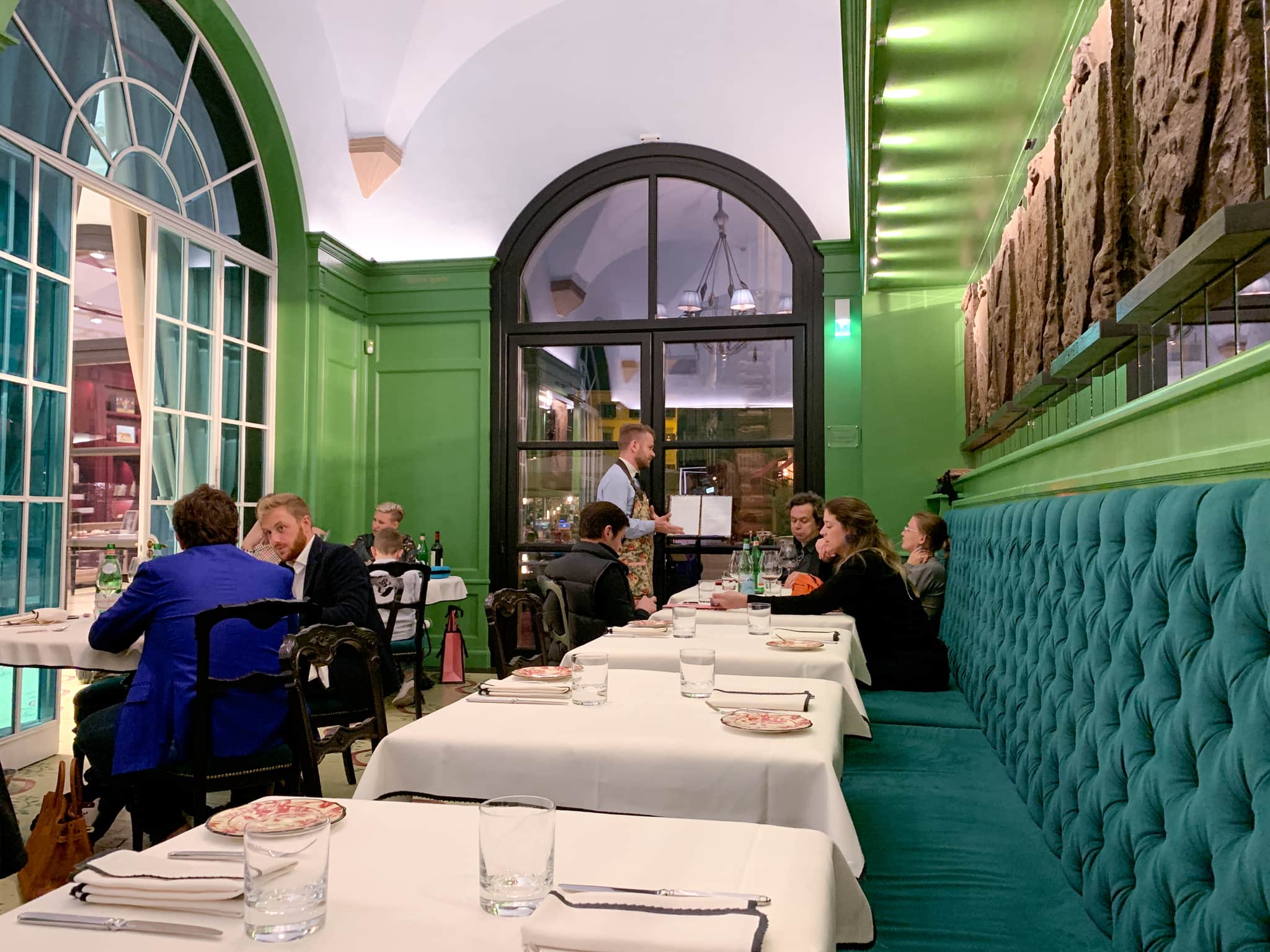 The green interior at Gucci Osteria in Florence