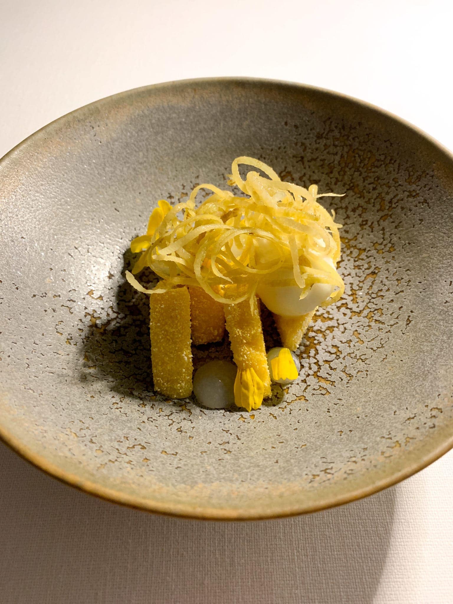 Crispy polenta with lemon zest and ice cream