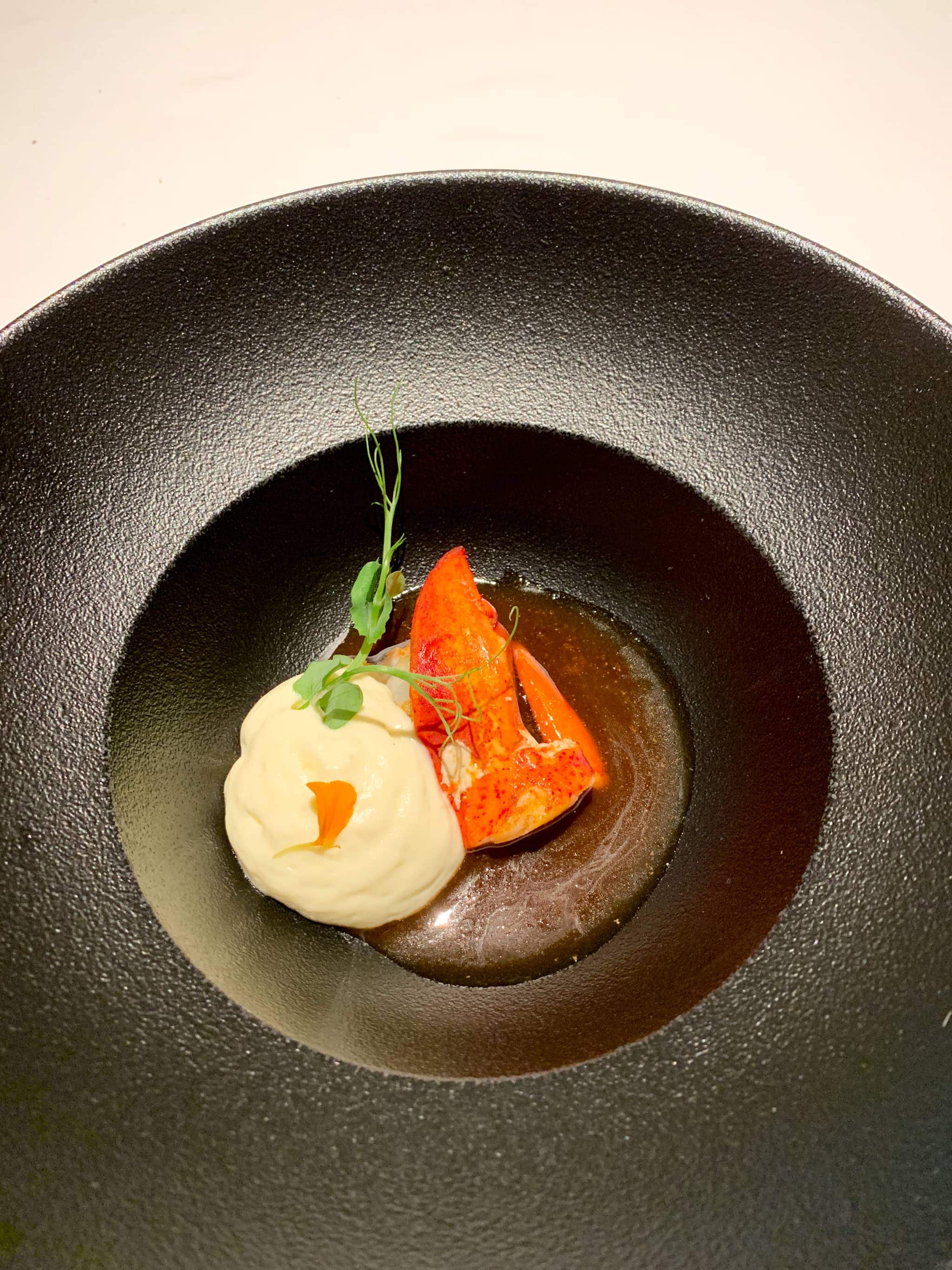 Lobster, its broth, and potato emulsion at Restaurant Massana