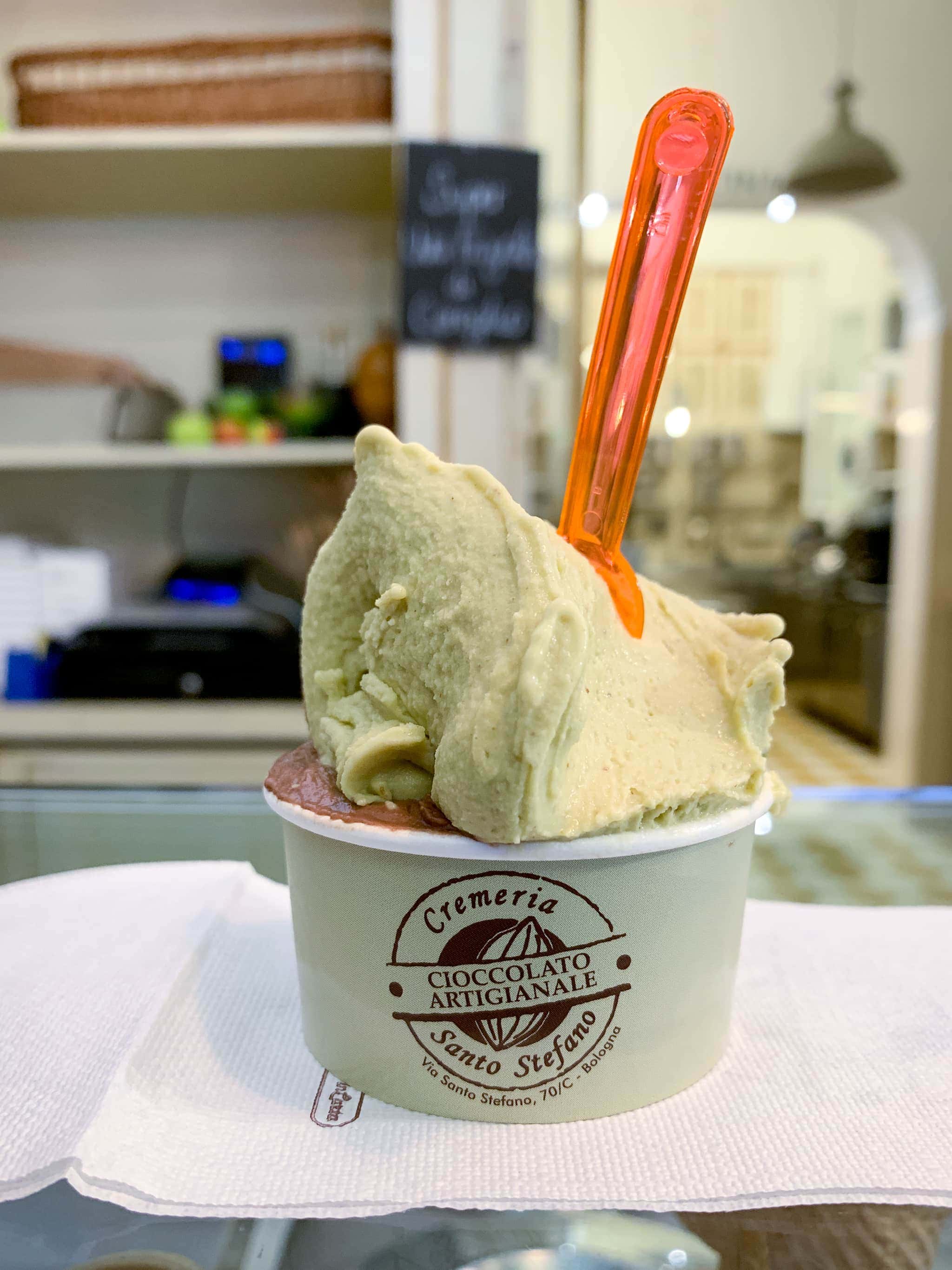 Cremeria Santo Stefano offers some of the best gelato in Bologna, like this cup of chocolate and pistachio