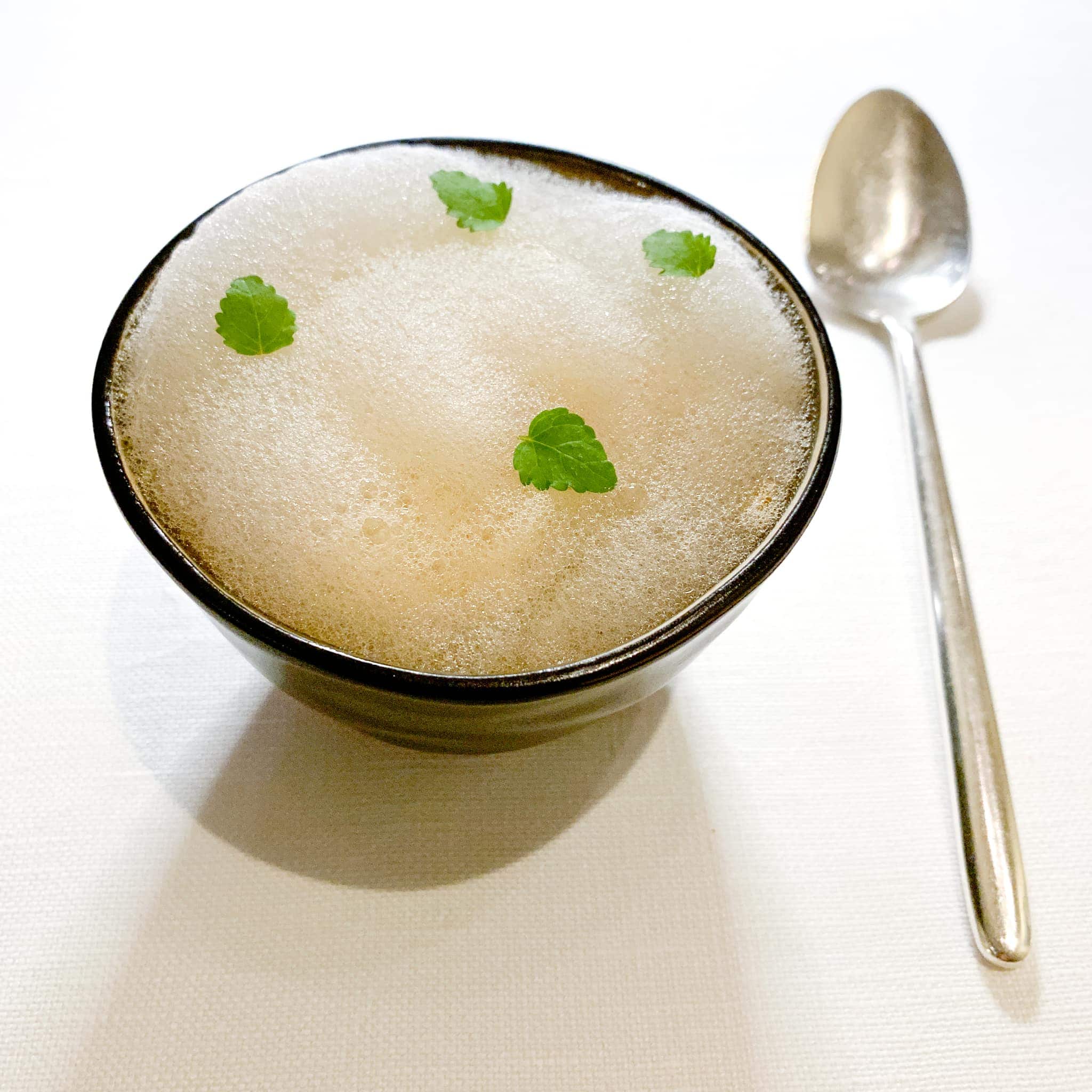 Pre-dessert with fruits and vegetables, topped with melon foam