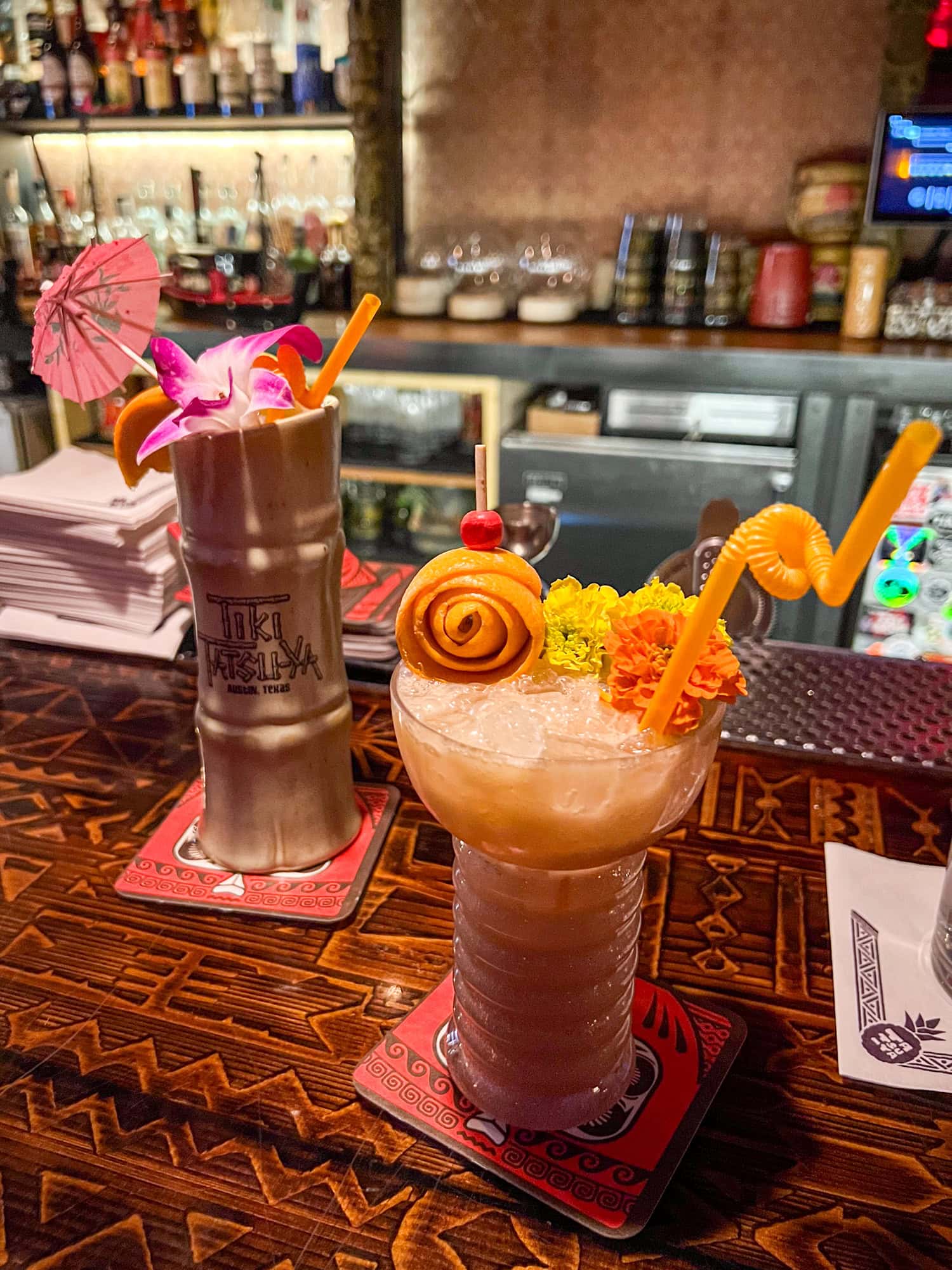 The Strip 'n Go Naked (left) and a Pearl Diver at Tiki Tatsu-Ya in South Austin.