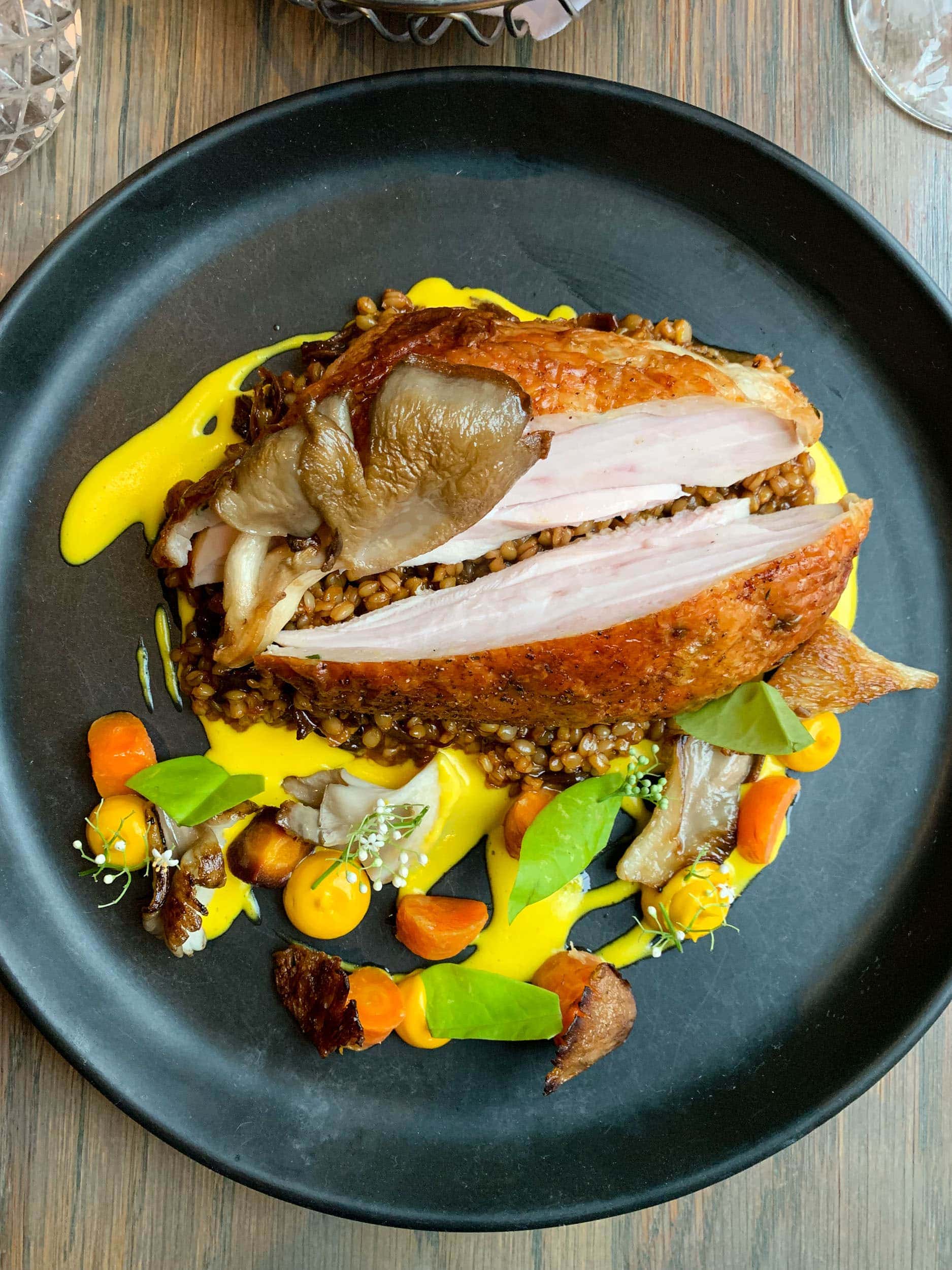 Dewberry Hills Farm chicken with oyster mushroom, carrot, farro, and bay laurel