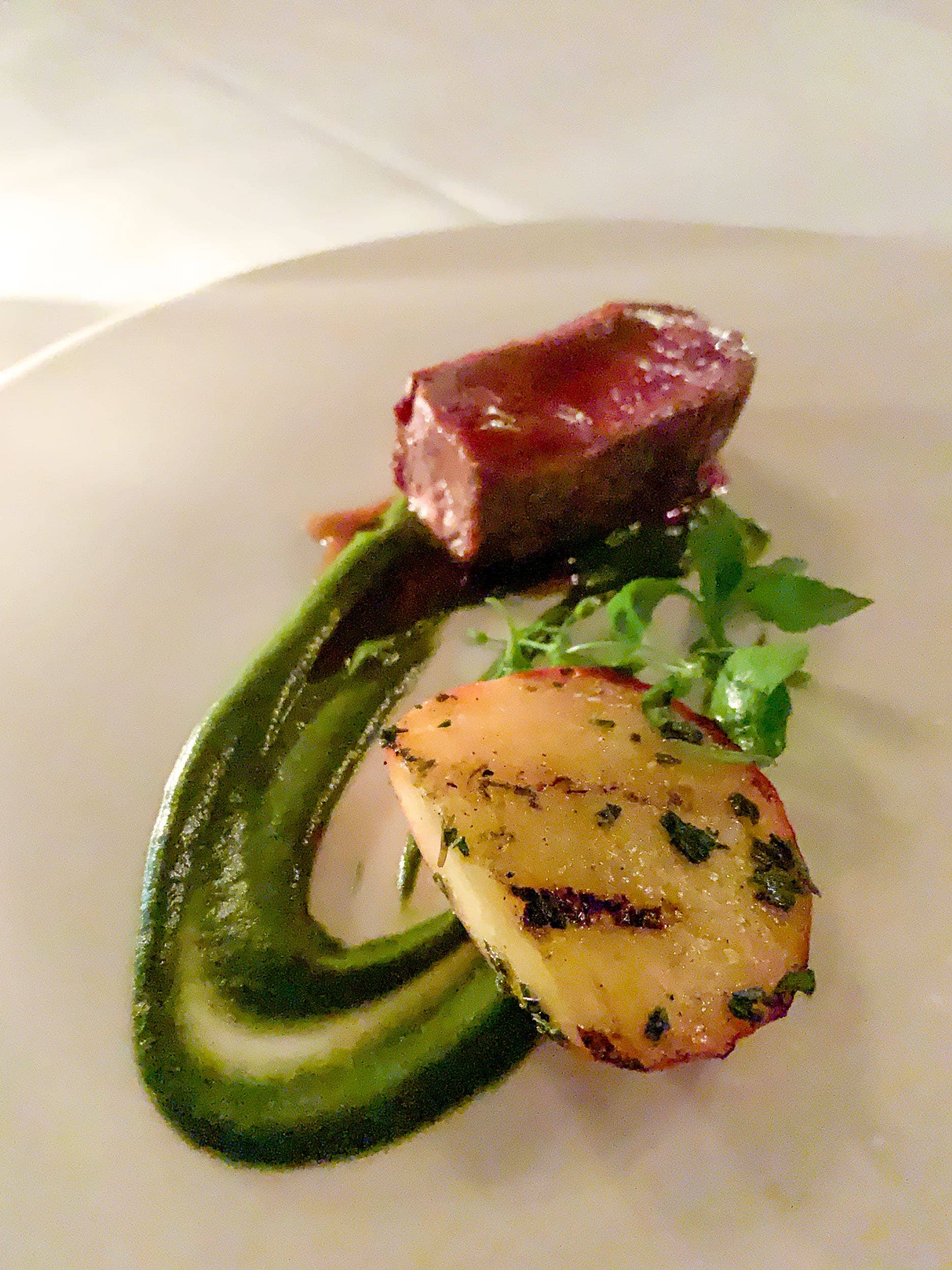 Colorado lamb loin with grilled stone fruit, stinging nettles, and tarragon