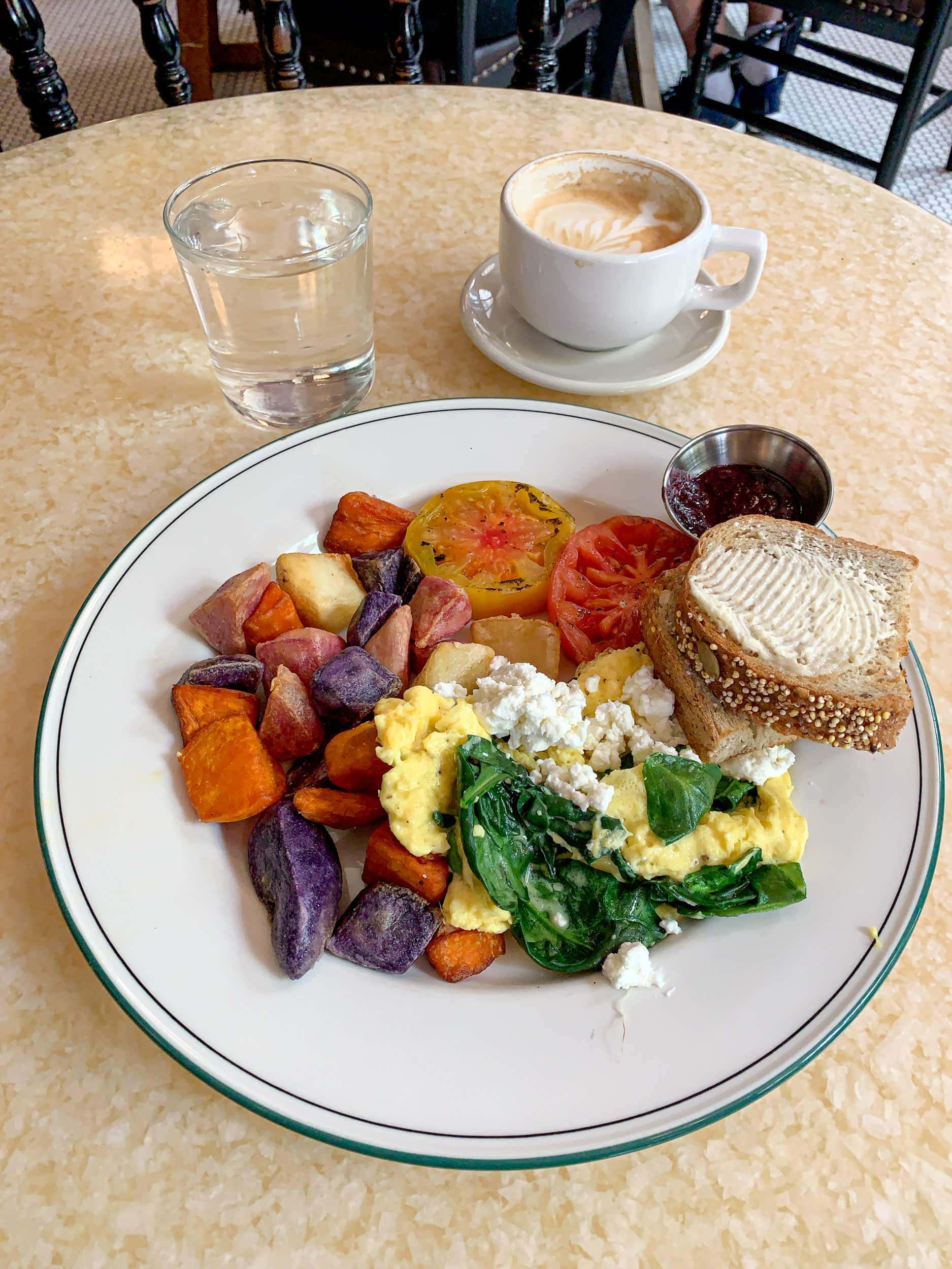 A colorful plate of eggs and potatoes at 1886 Cafe & Bakery in downtown Austin. 