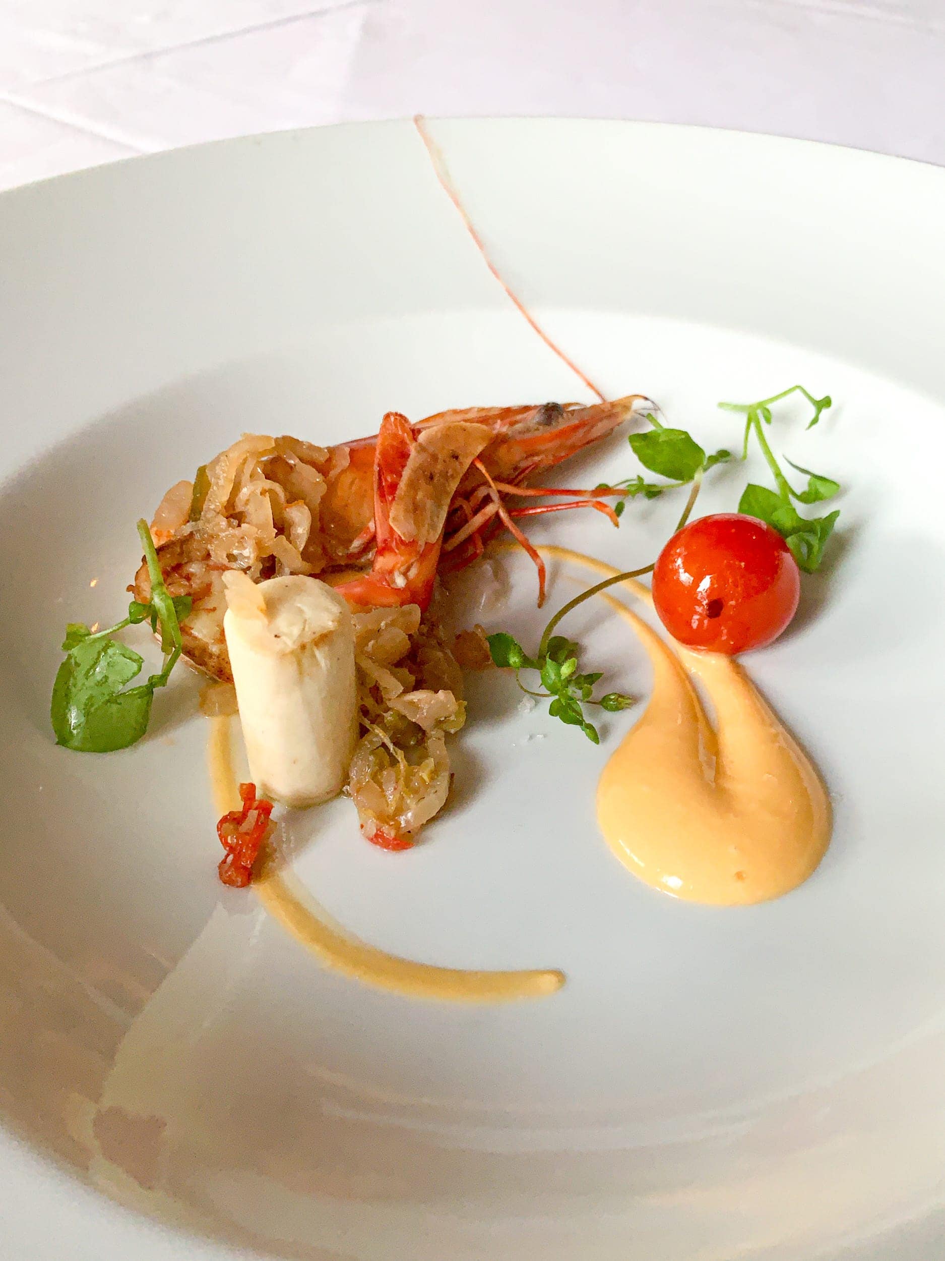 Prawns en escabeche with roasted cherry tomato, hearts of palm, and fresh lychee