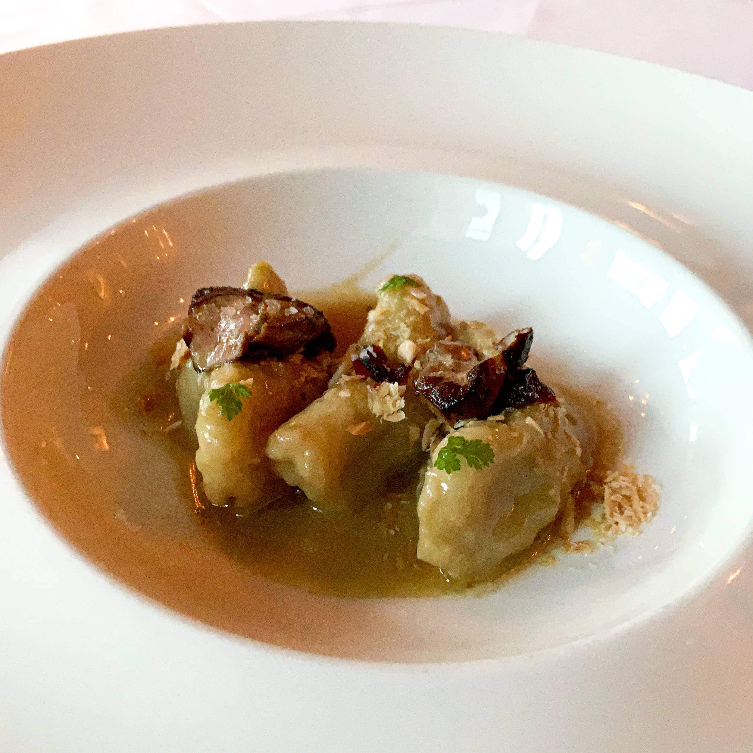 Signature prune-stuffed gnocchi with foie gras, almond, and vin santo at No.9 Park in Boston