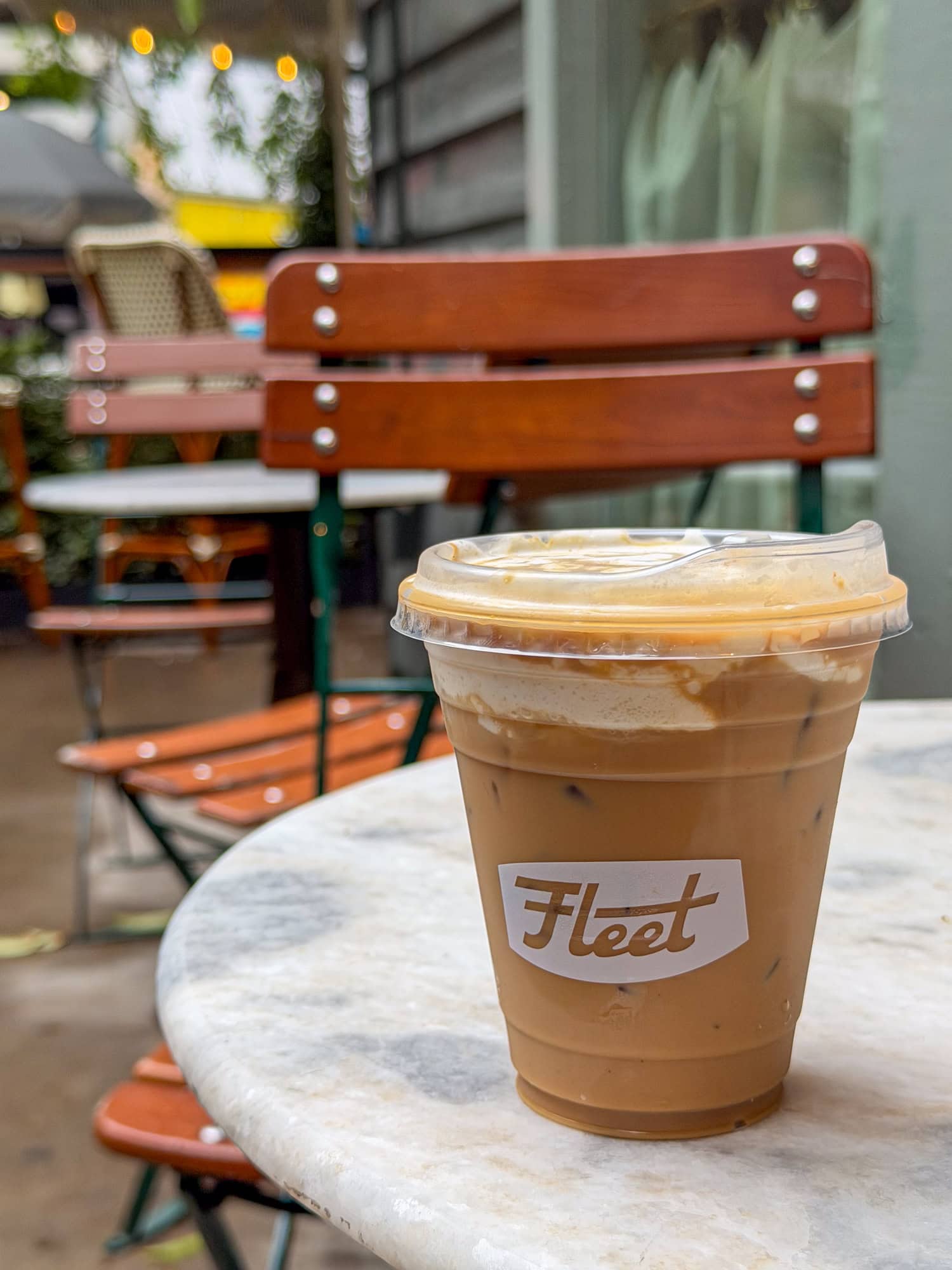 Iced Key Lime Pie Latte with whipped cream at Fleet Coffee on Rainey Street