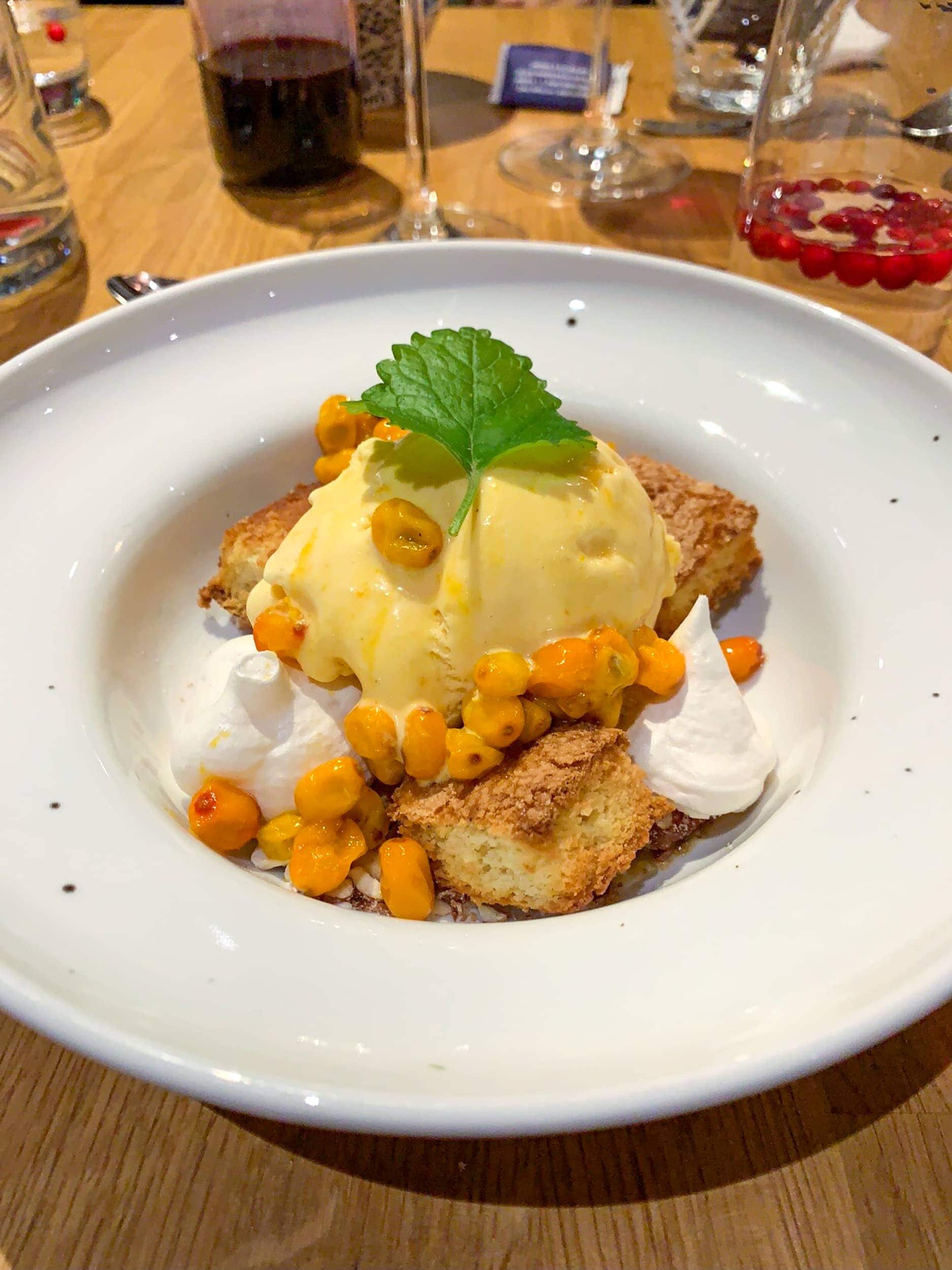 Sea buckthorn ice cream with cloudberries