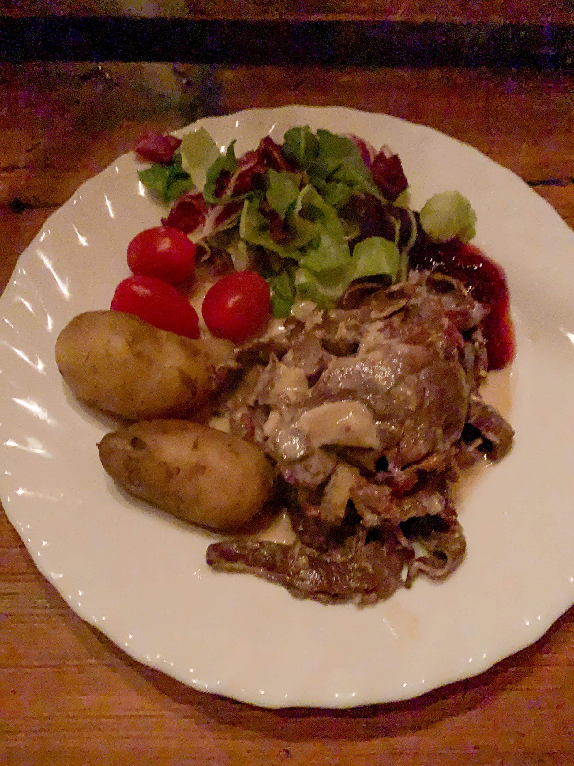 Reindeer meat with potatoes and salad