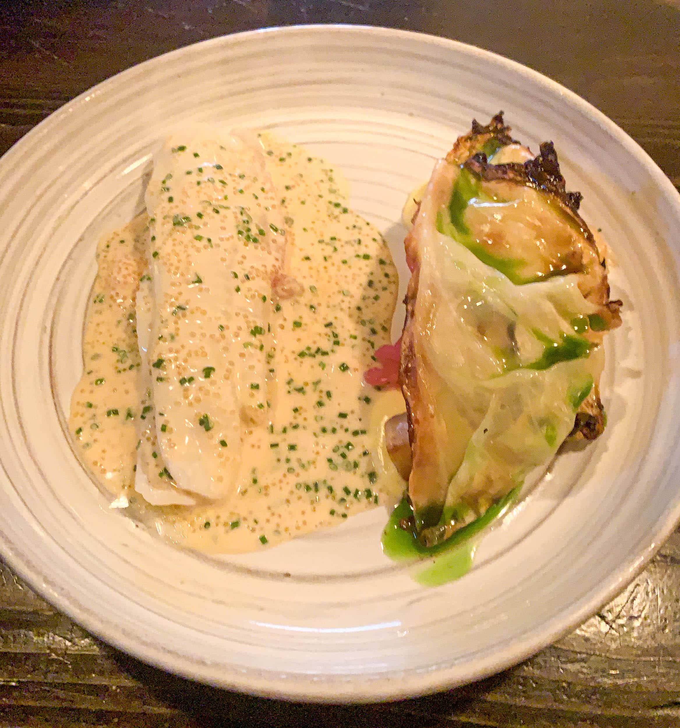 Lemon sole with a cream of aged cheese, celeriac, roasted cabbage, and a smoked clam butter sauce with bleak roe at Restaurang Natur in Gothenburg, Sweden