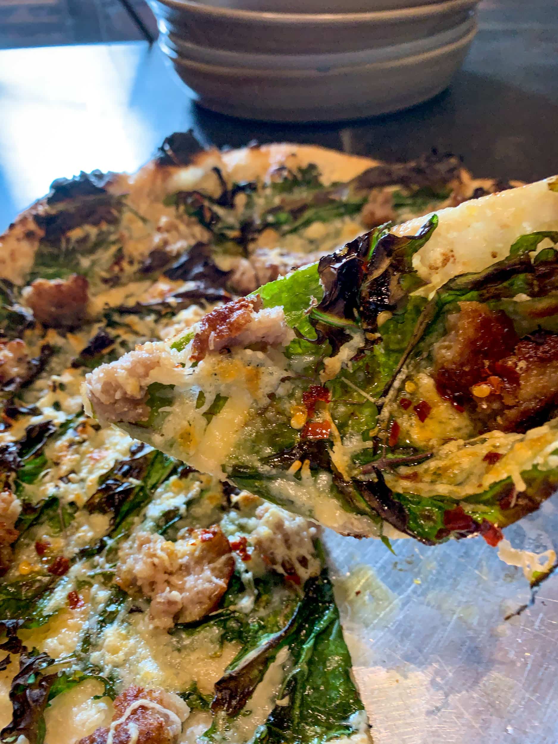 Meatball pizza with cheese mayo, and kale at City House in Nashville, TN