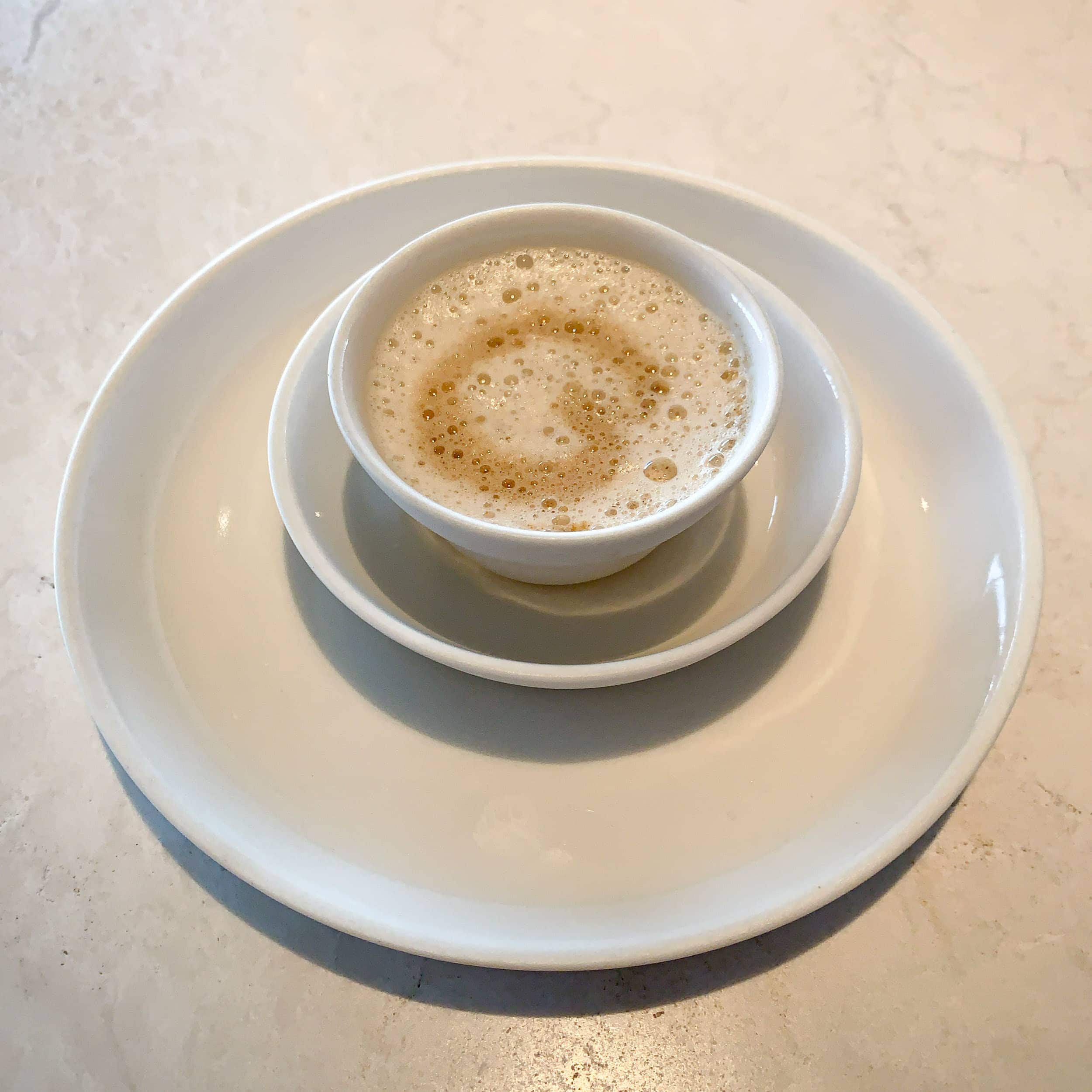 Cep mushroom soup with walnuts and pears