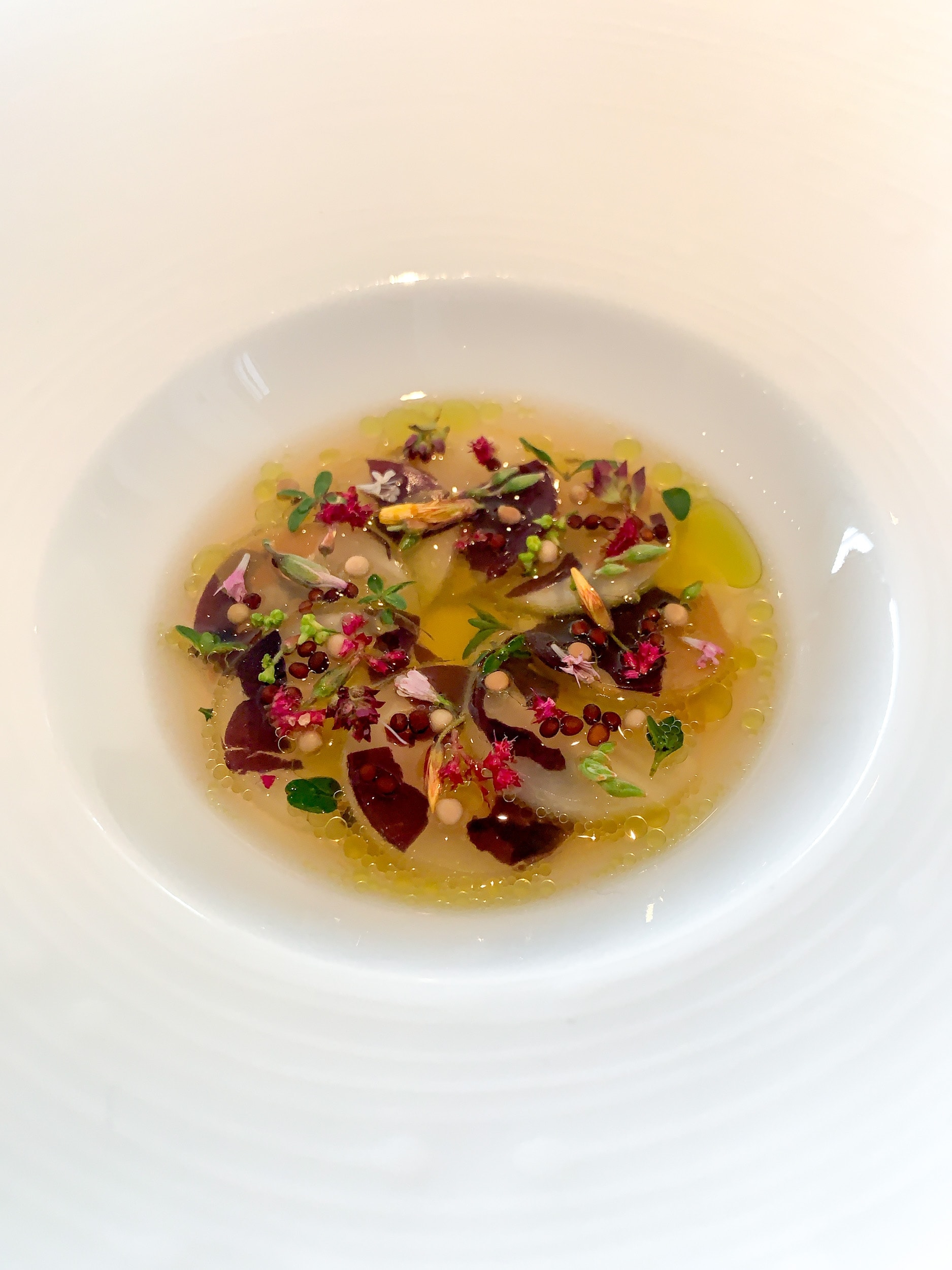 Pickled celeriac with sol, dried mussels, and aromatic seeds