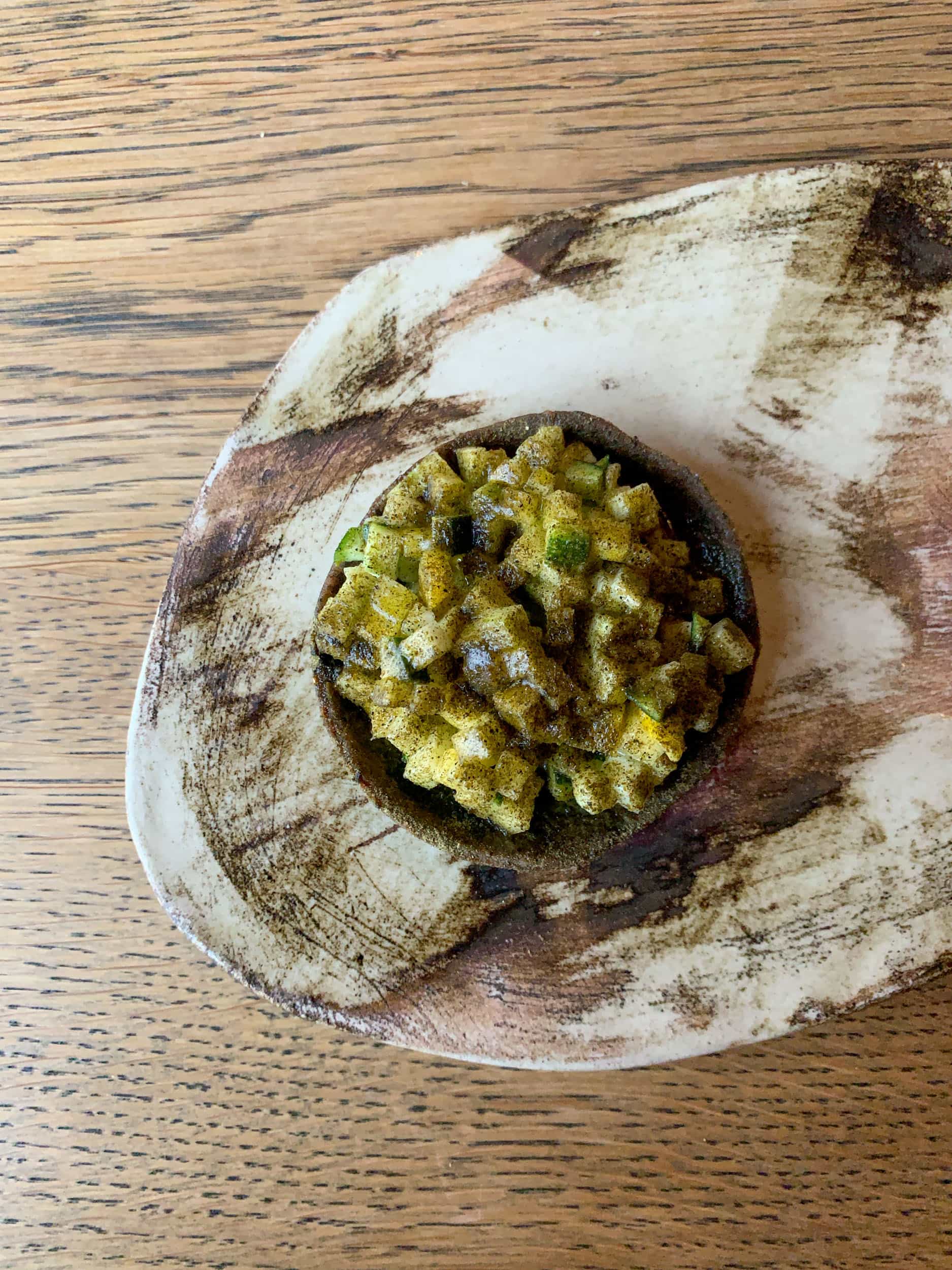 Buckwheat and fava tart, courgette, and watercress