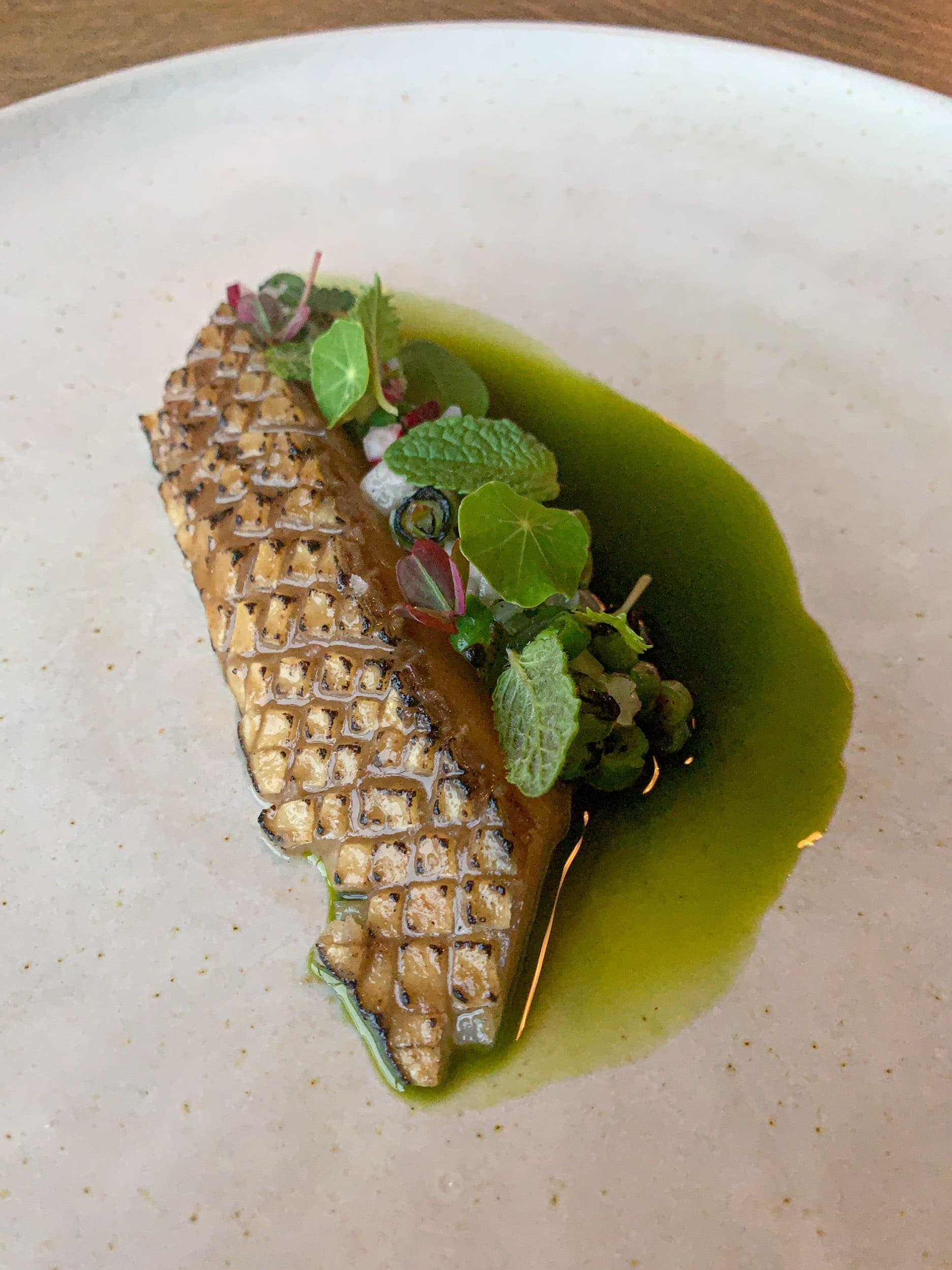 Mackerel, haricot vert, parsley, and garden herbs at Amass Restaurant in Copenhagen.