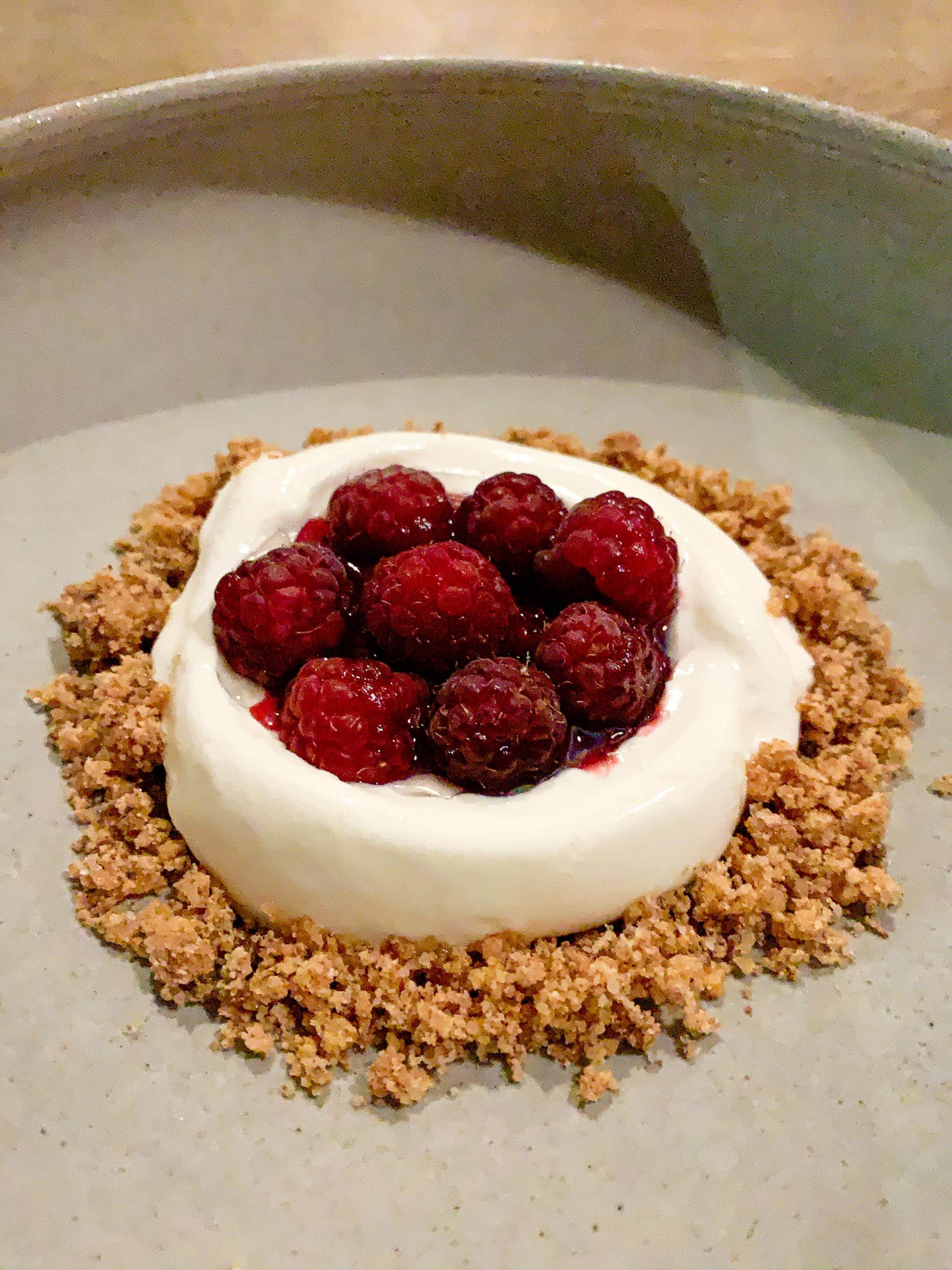 Milk ice cream and raspberry, yogurt, and coffee at Amass Restaurant.