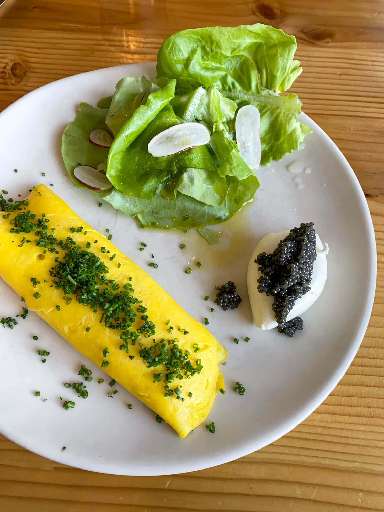 French omelet with creme fraiche and caviar for brunch at Emmer & Rye