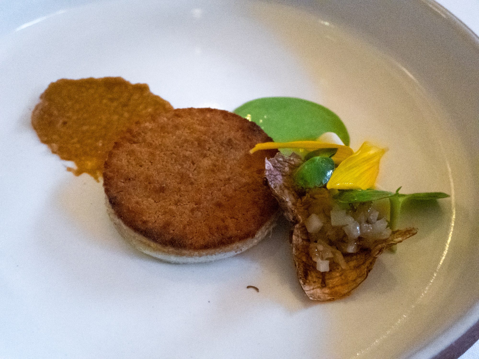 Toasted sunflower at Eleven Madison Park, a 3-star Michelin restaurant in New York City. 