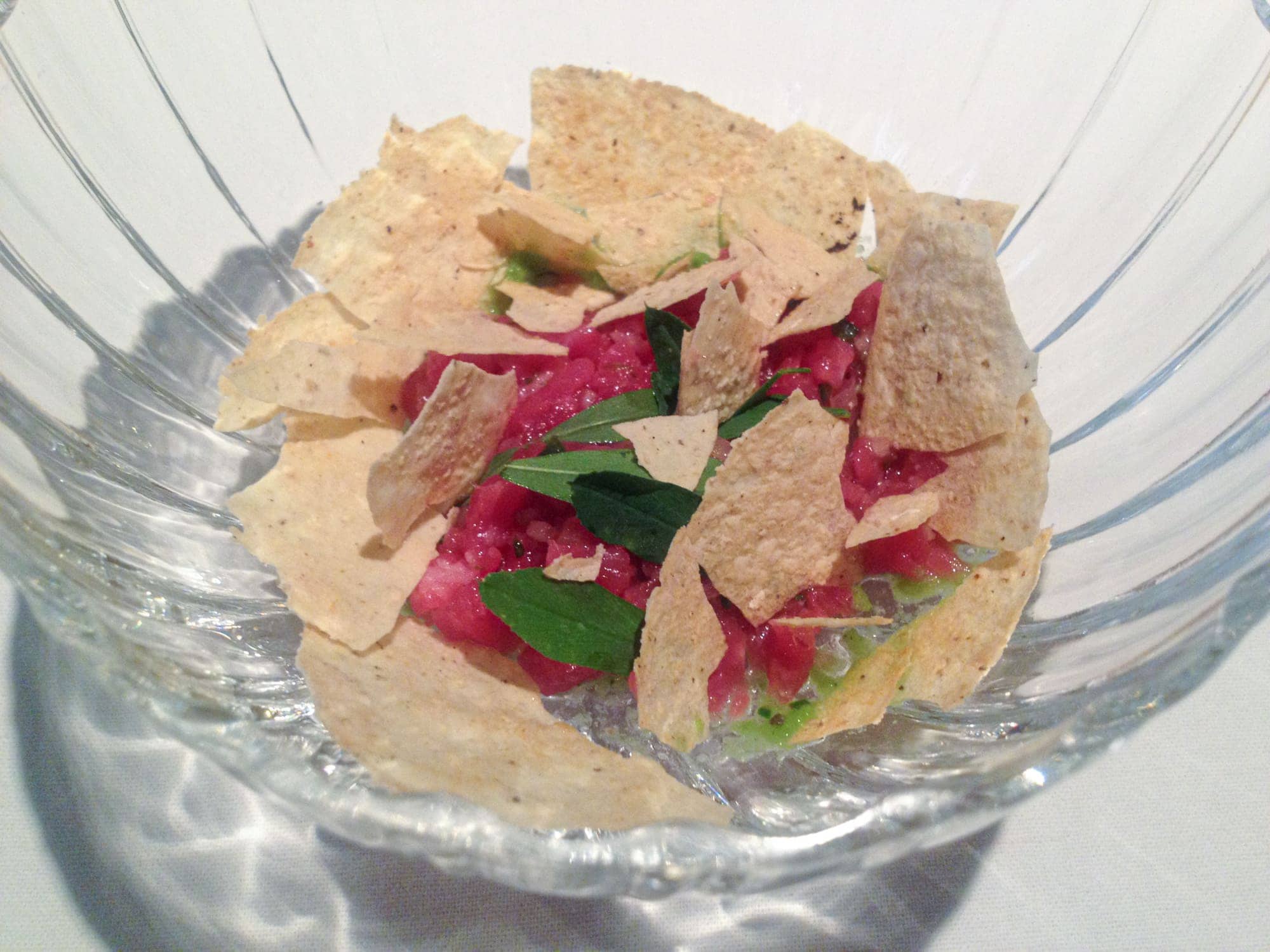 Roasted beef tartare with alfalfa and serrano chile oil