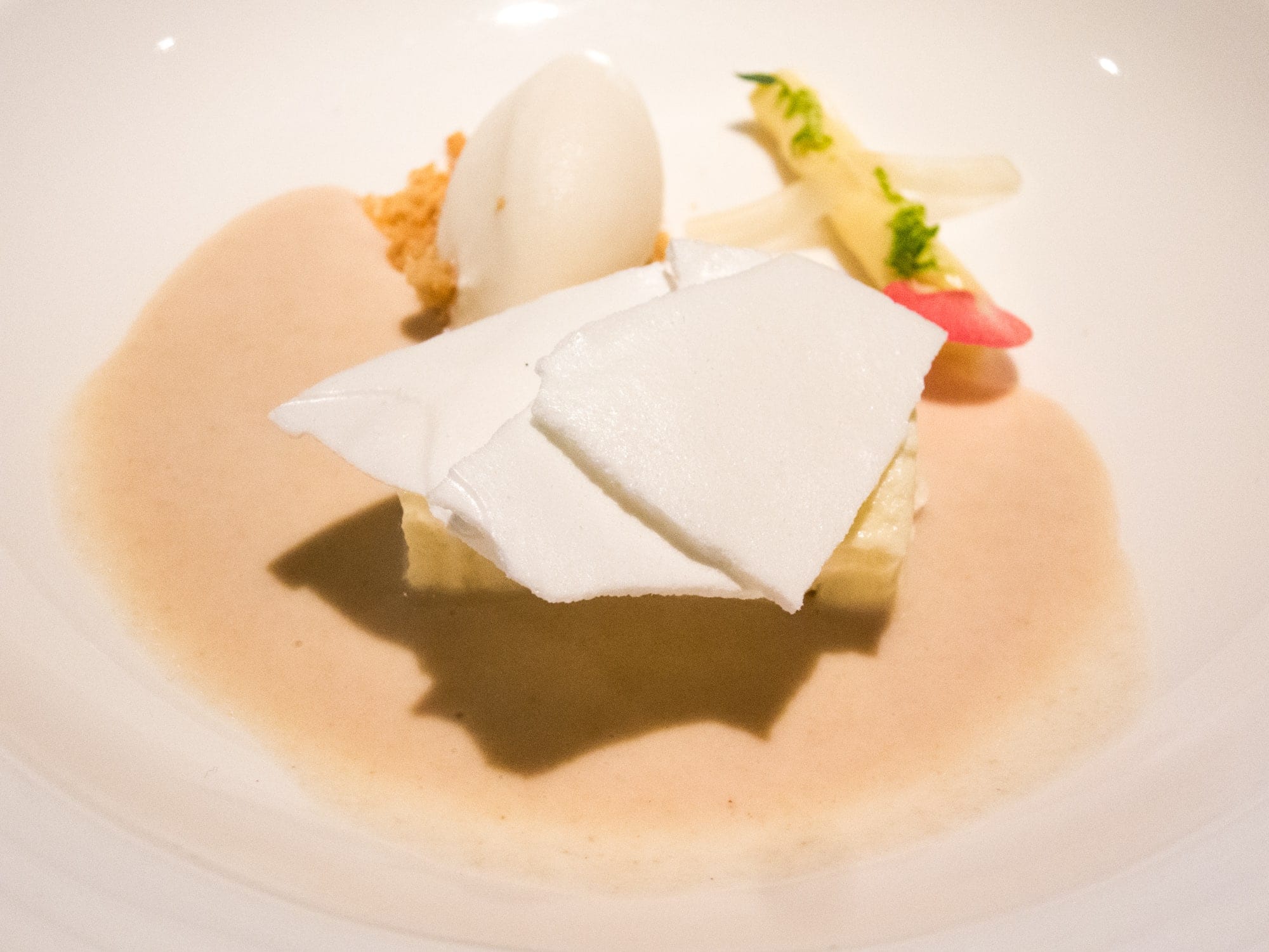 Thyme glazed biscuit, lemon gelatin, ice cream, cookie soup, and white chocolate at Pujol restaurant