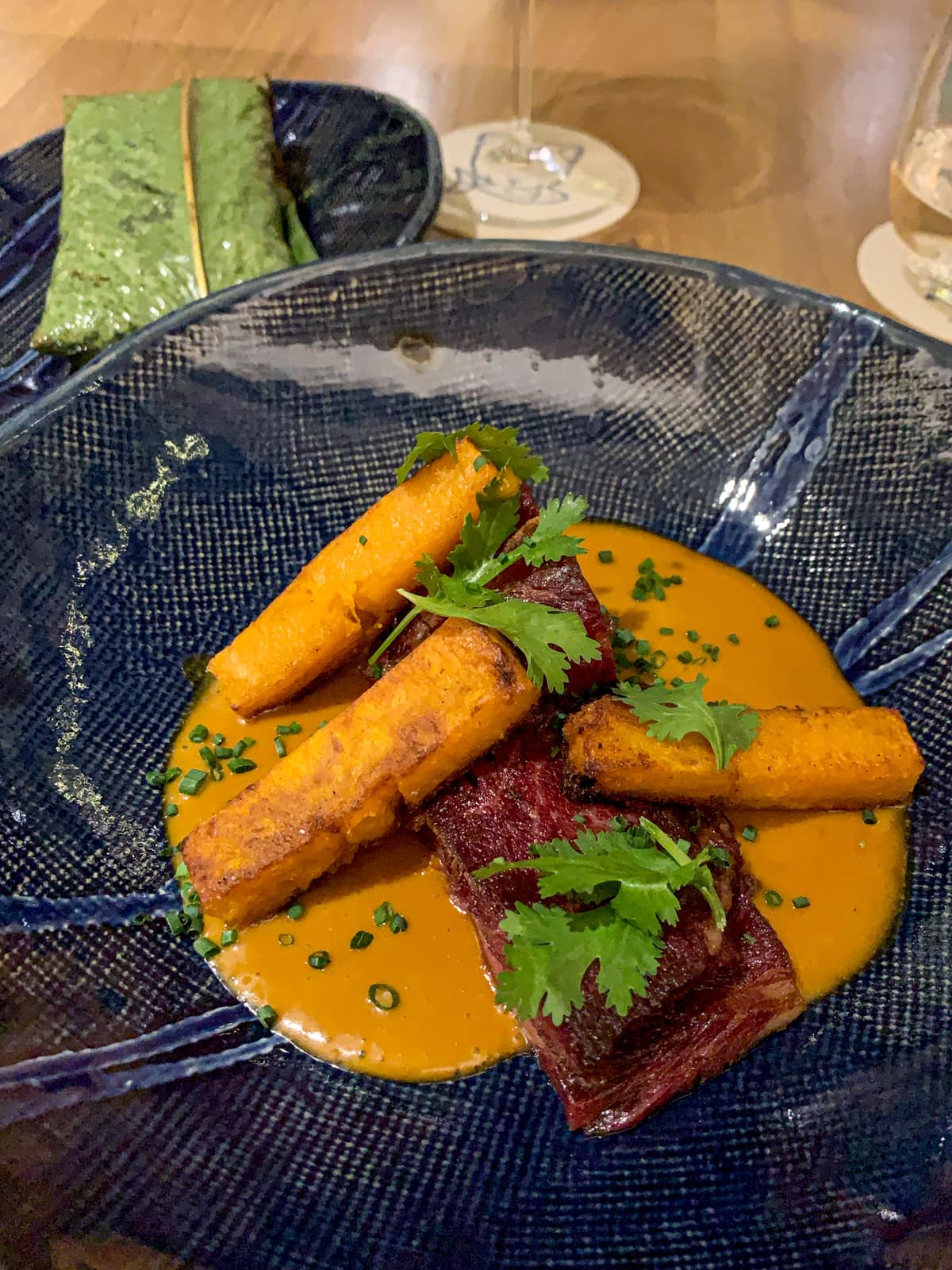 Malay-style grilled beef short rib, Andean pumpkin, aromatic rice, rendang sauce