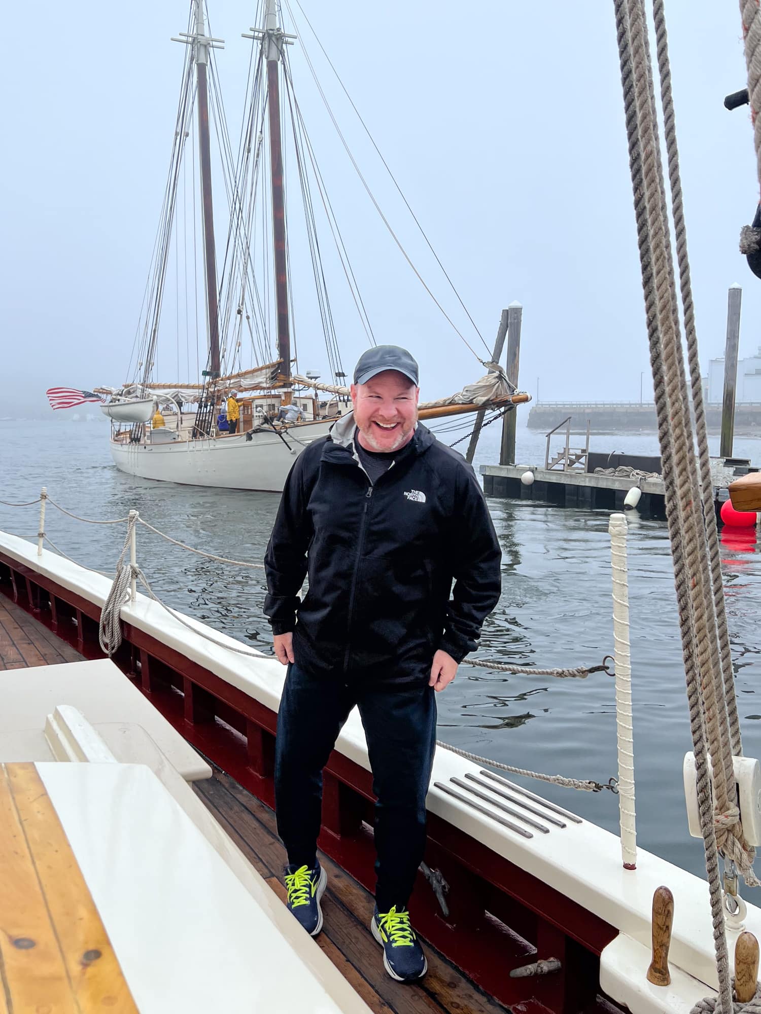 Dave laughing aboard Schooner J & E Riggin in Rockland Harbor, Maine