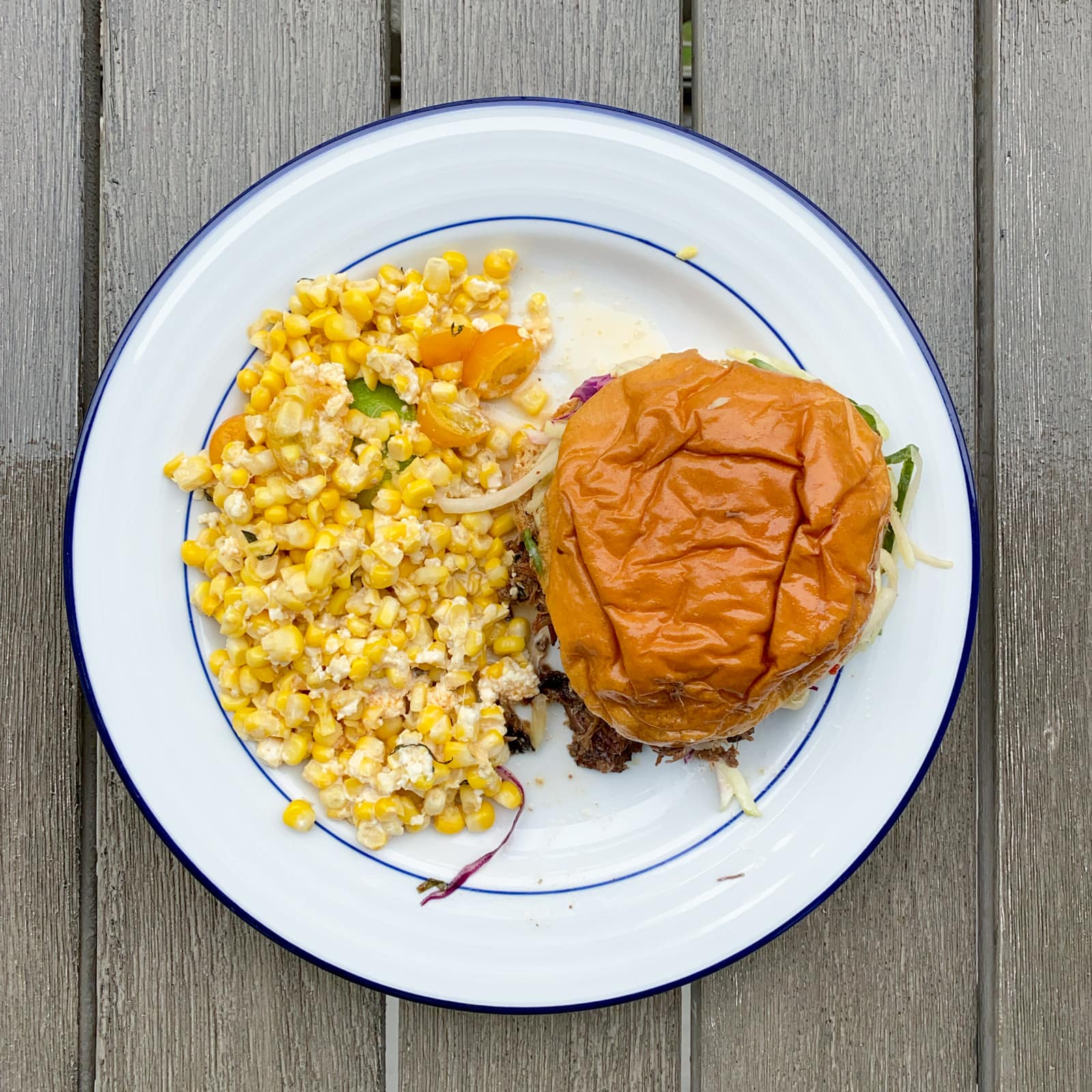 Oak smoked beef brisket sandwich with TX sweet corn from Loro