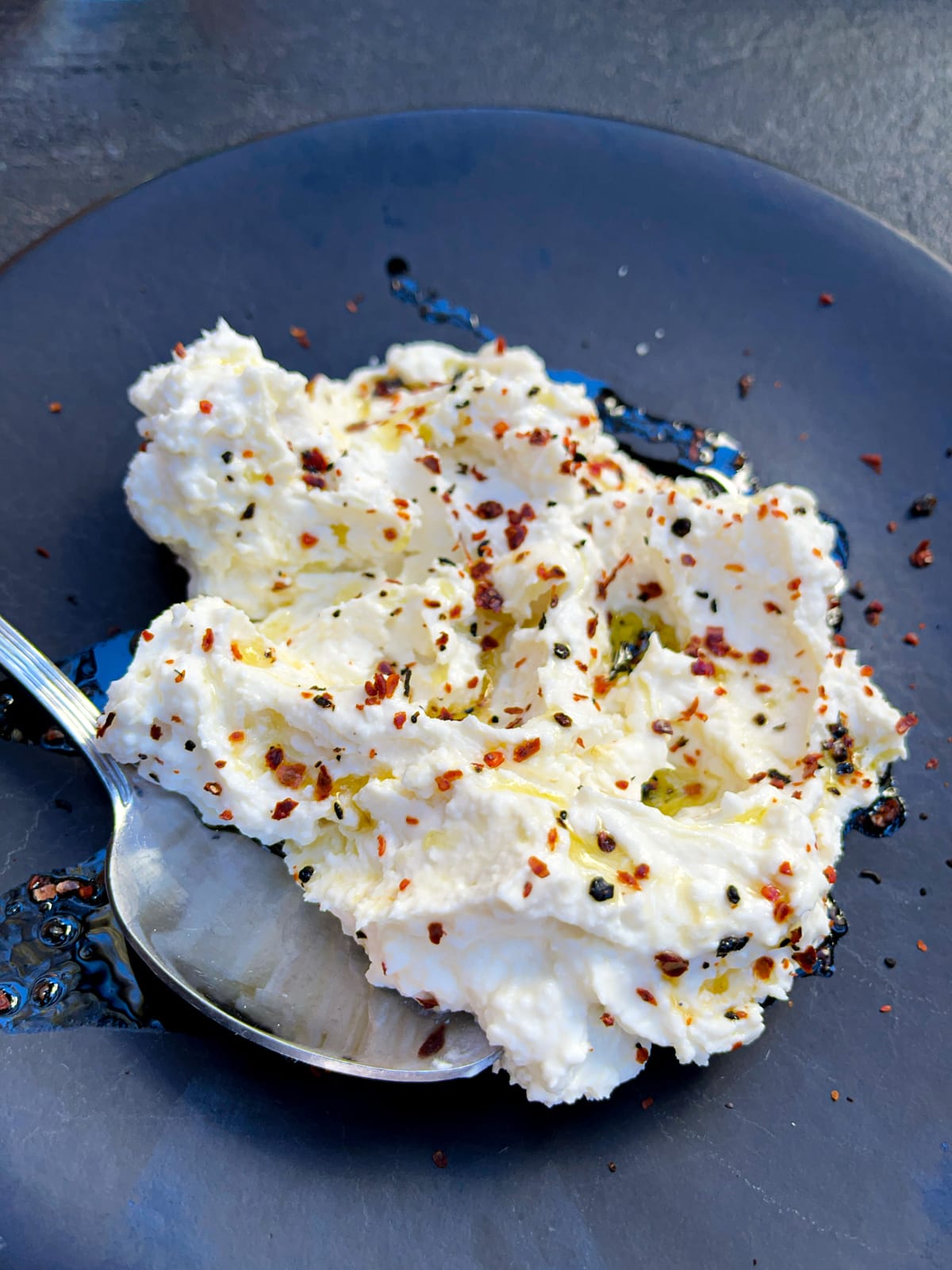 Whipped feta with crushed pistachio, aleppo, olive oil, and lemon zest at Aba