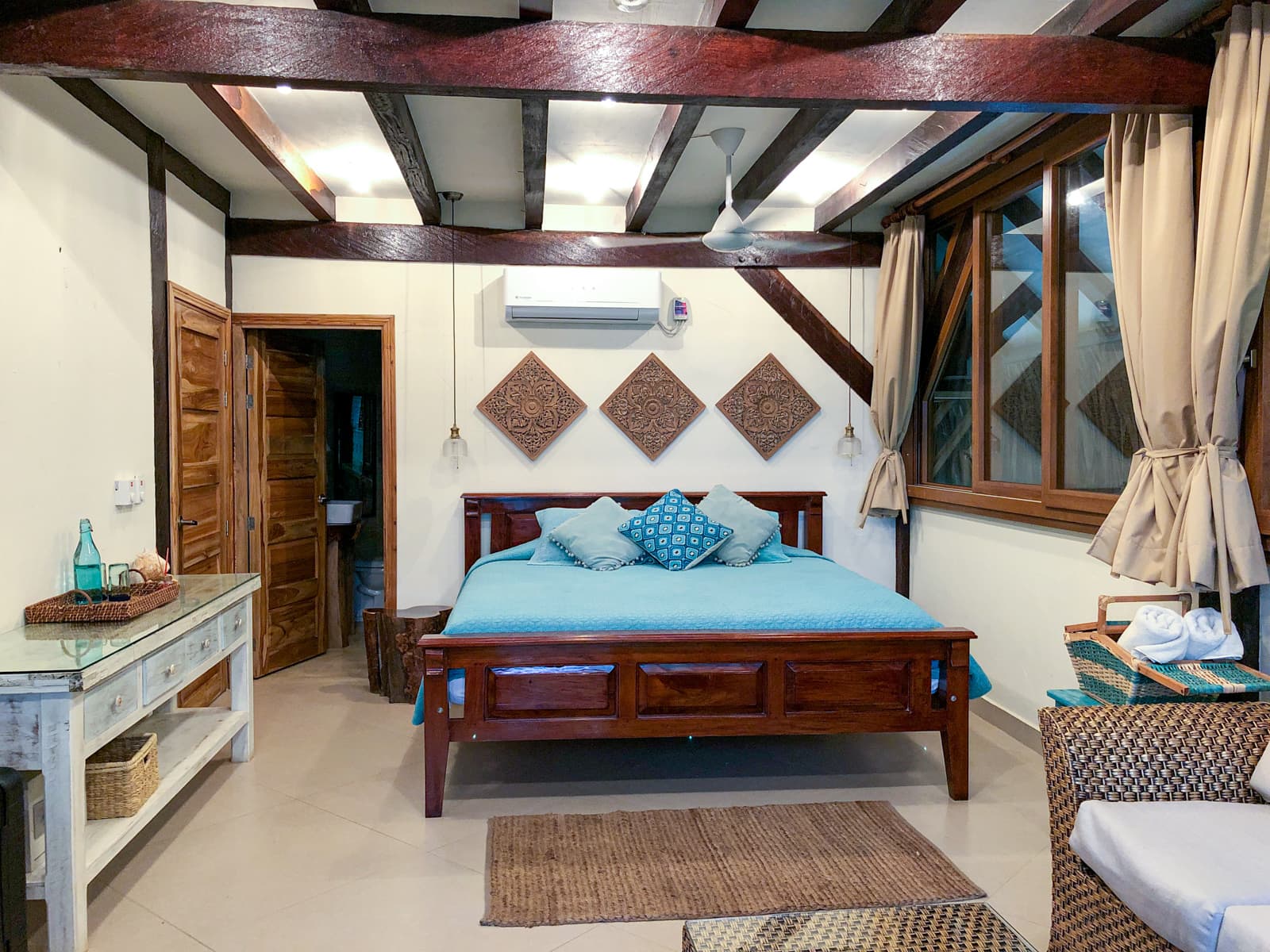 King-sized bed at Cayena Beach Villa