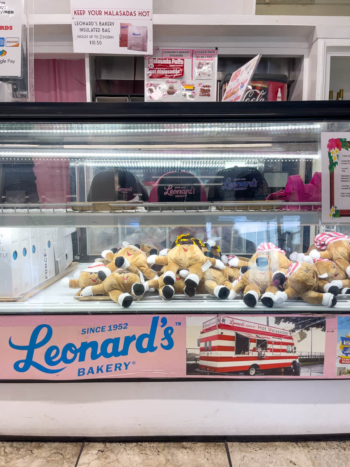 Souvenir malasadas and hats