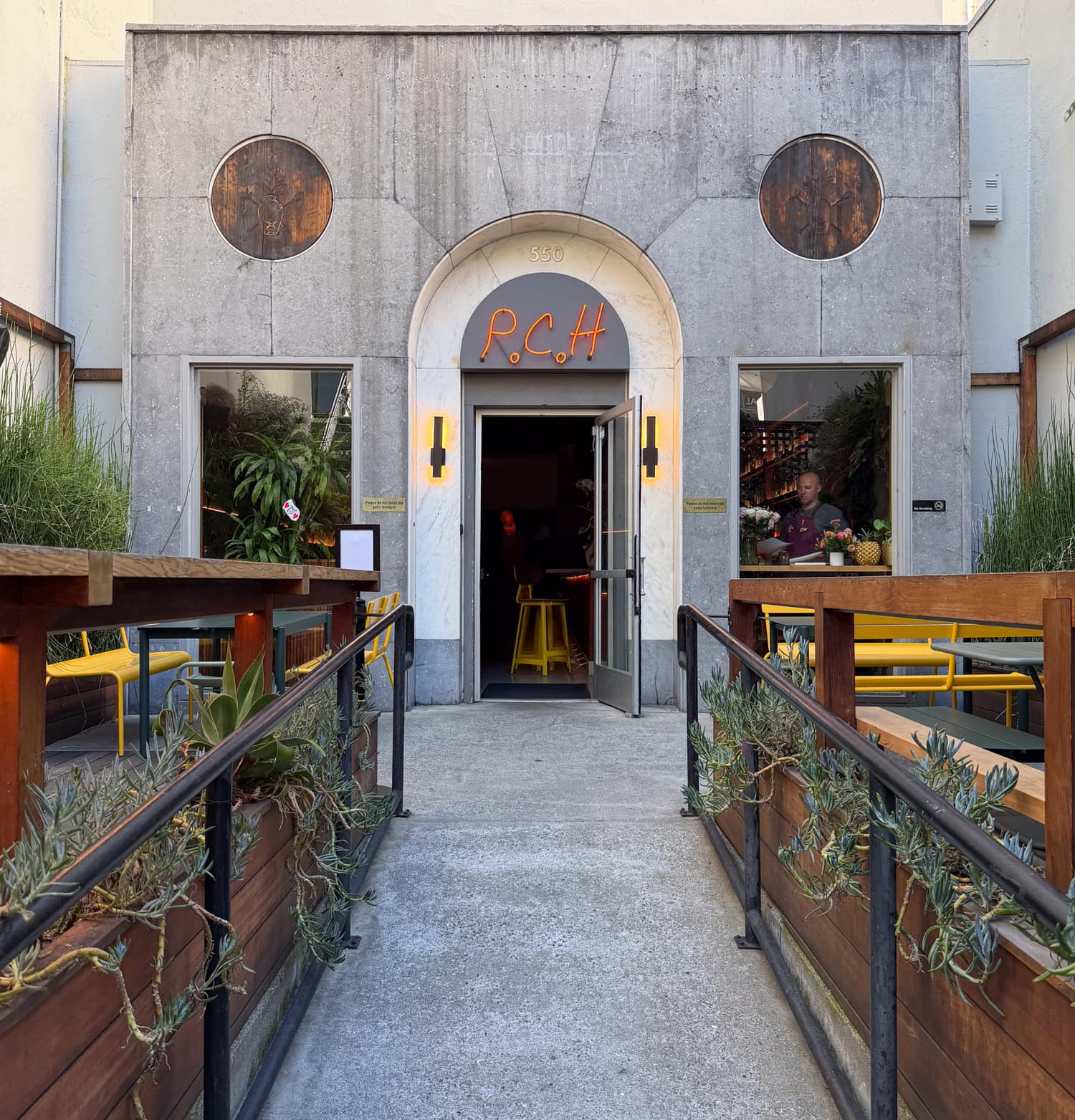 Exterior entrance of Pacific Cocktail Haven cocktail bar.