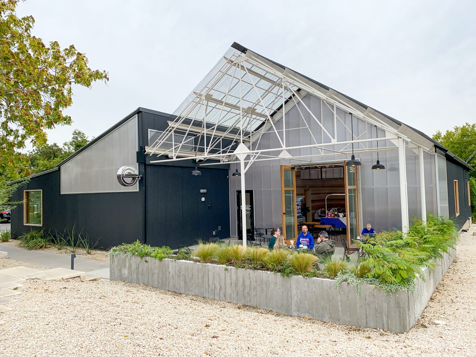 Outside Greater Goods Coffee Roasting Co. in East Austin