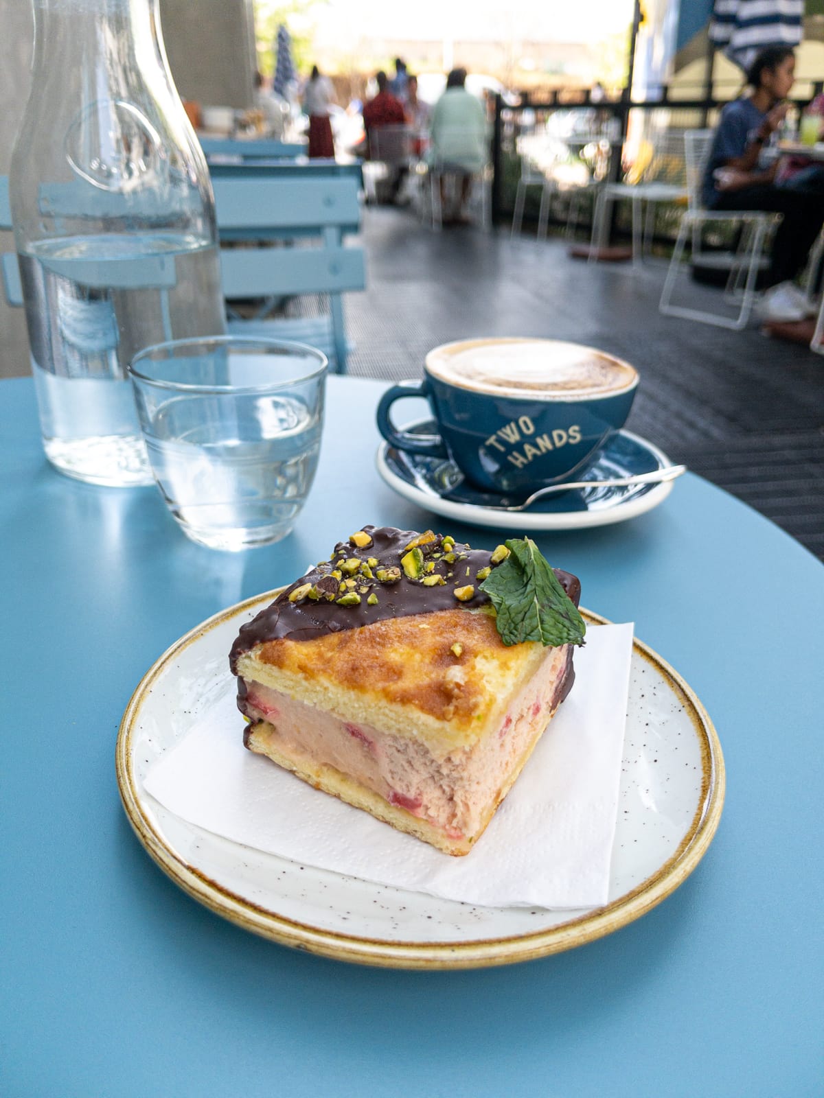 Strawberry and pistachio ice cream sandwich with a cappuccino at Two Hands on South Congress Ave. 