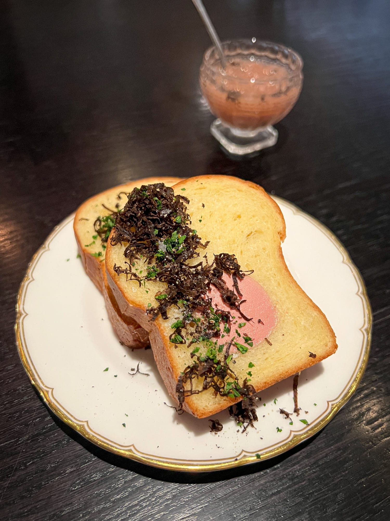 Brioche filled with chicken liver mousse and a jam of Périgord truffle and shallot on the side