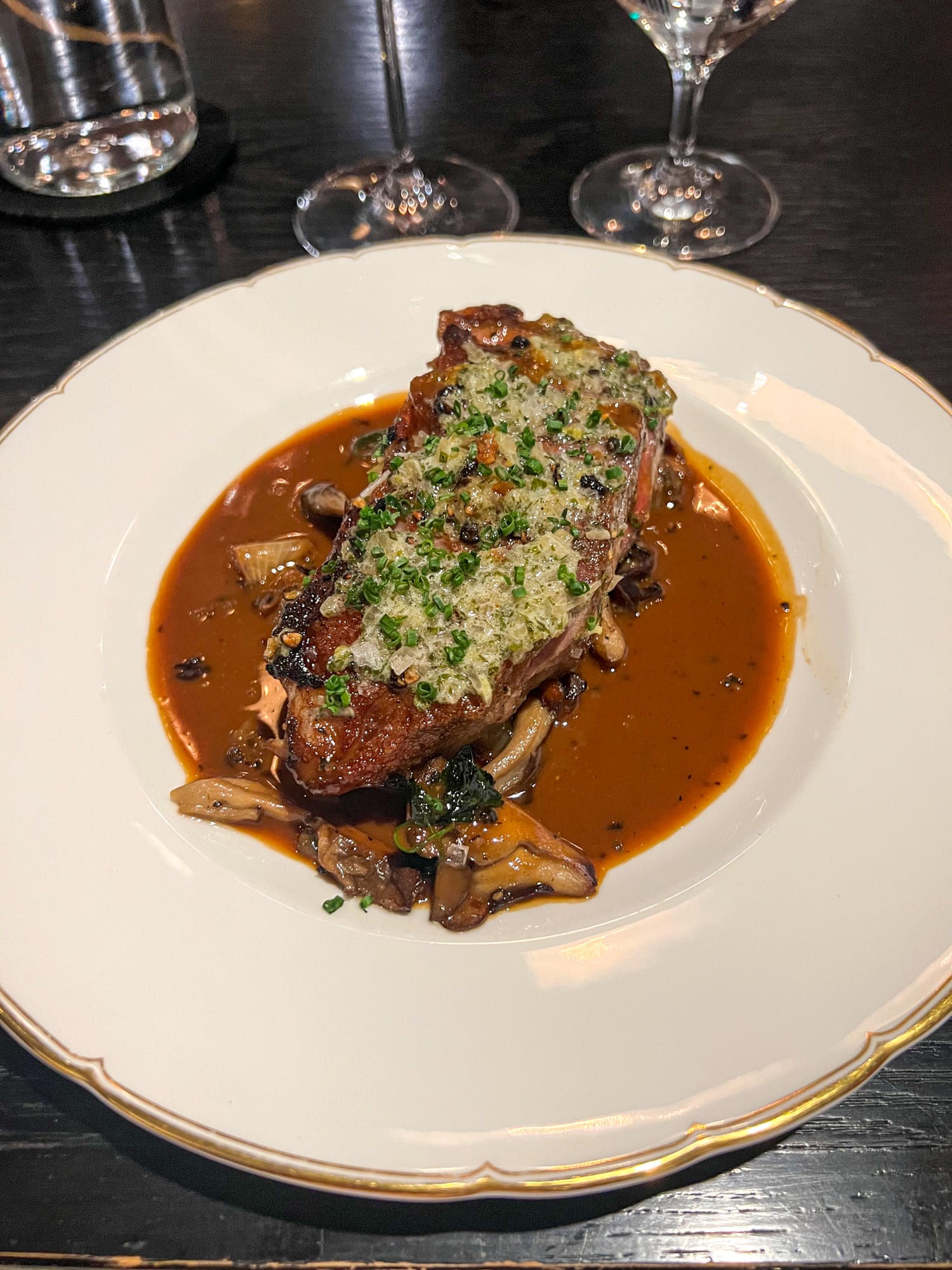 Steak au poivre with oyster & maitake mushroom, cipollini onion, and peppercorn jus at Pasjoli, Santa Monica