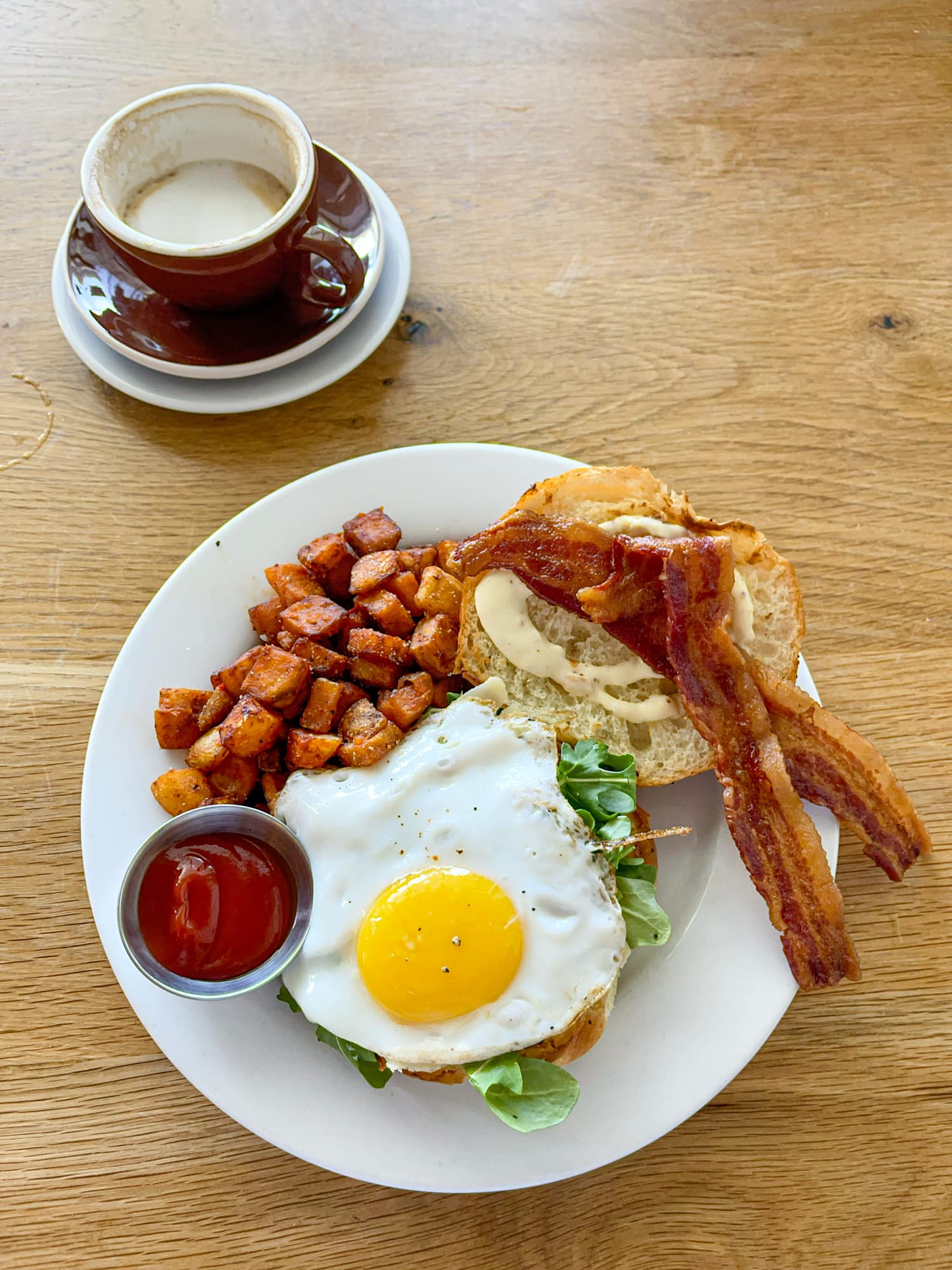 Fried egg sandwich with sweet potato hash at Hank's in Central Austin