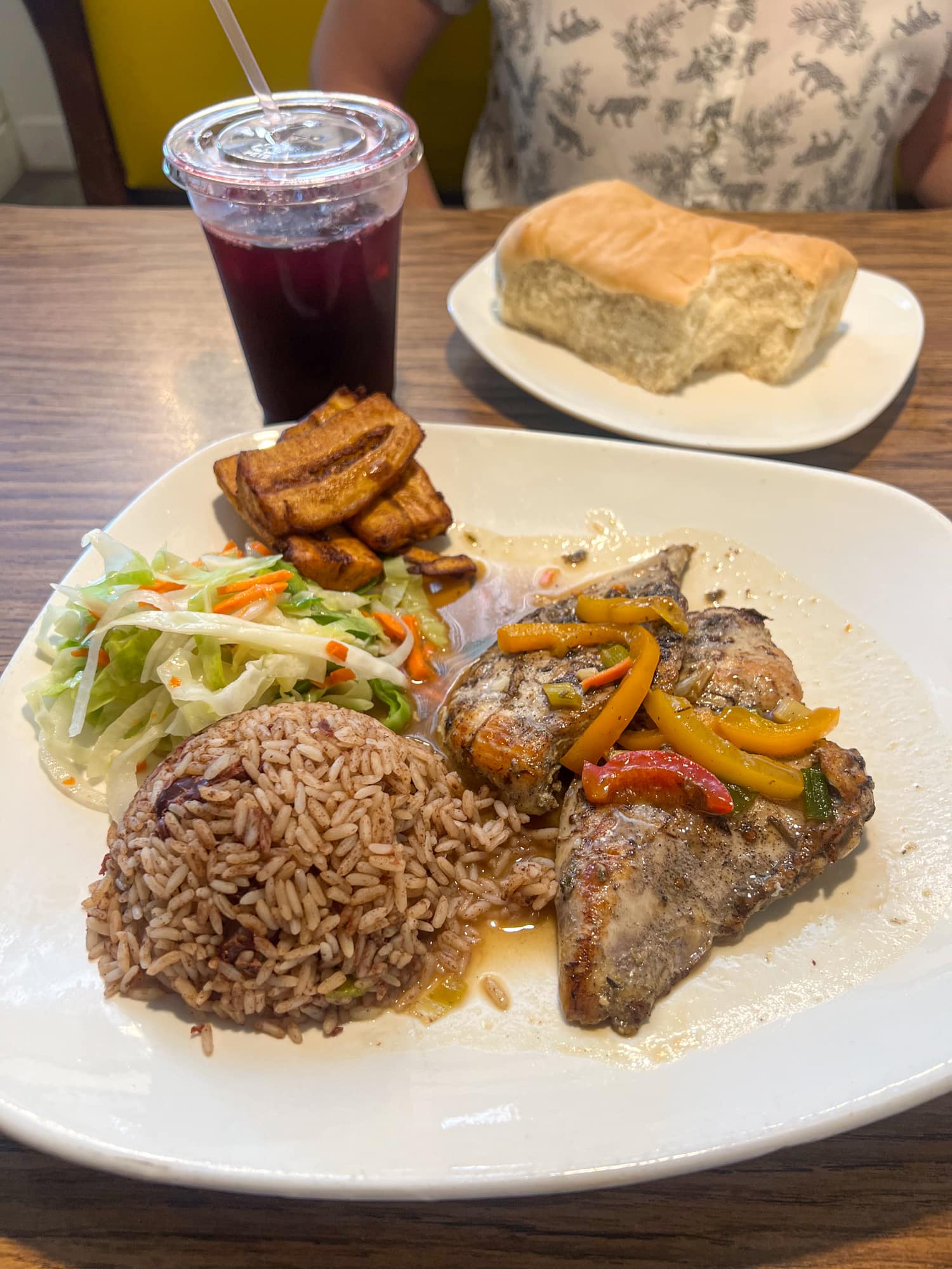 Jerk chicken breast with rice and beans and sweet plantains