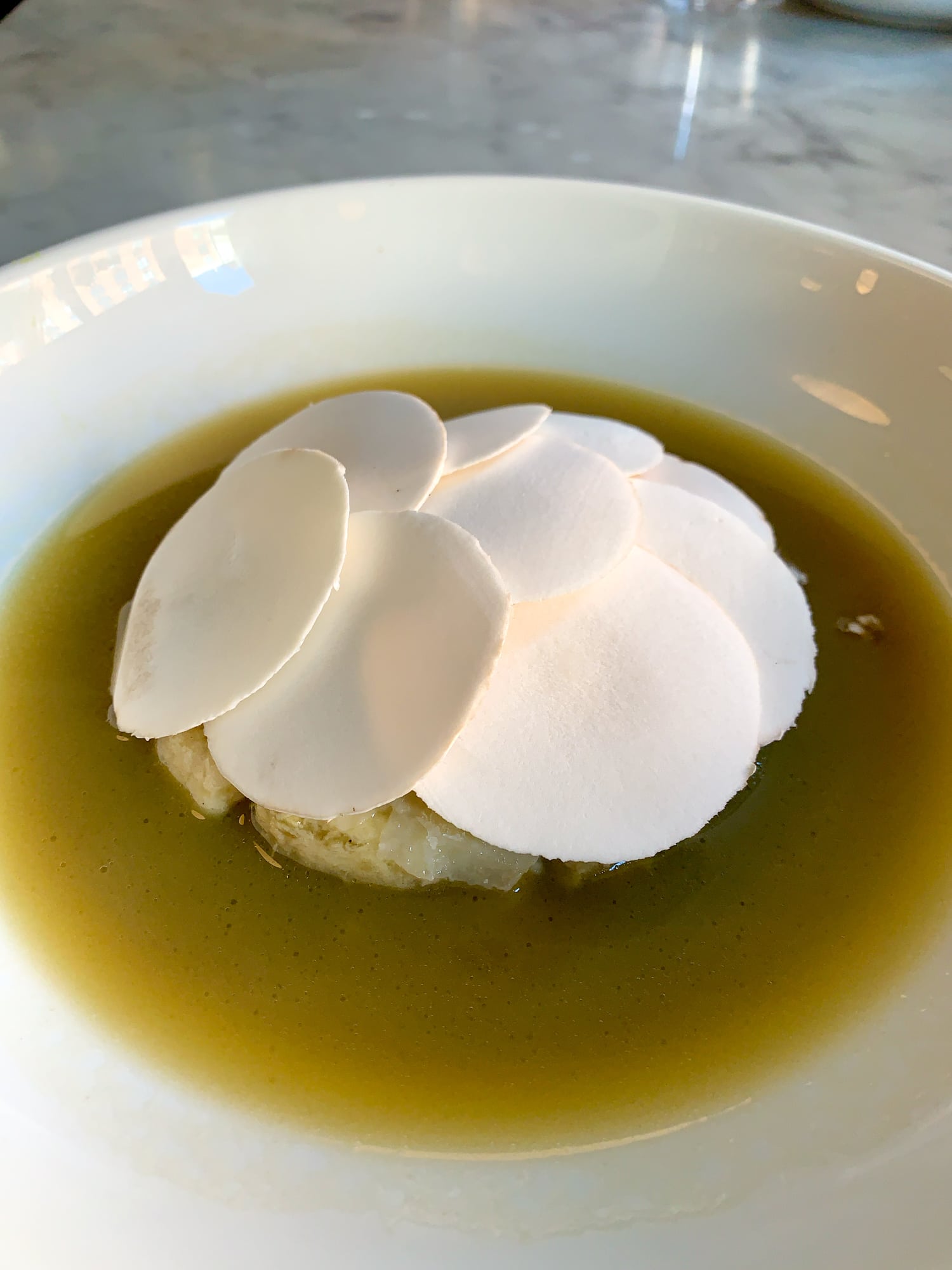 Ricotta dumplings with mushrooms and pecorino Sardo, a signature dish at Estela NYC