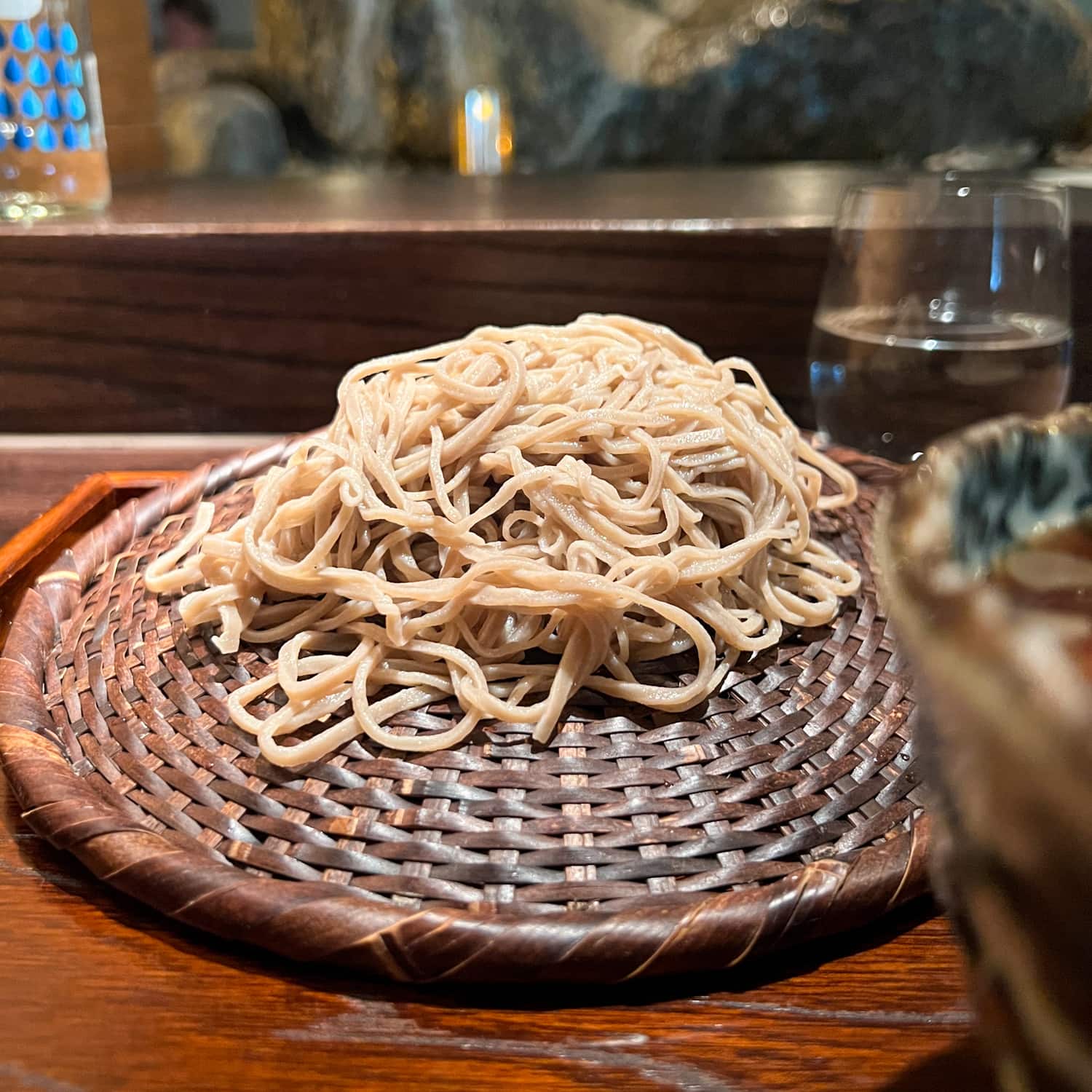 Fresh soba noodles on a bamboo mat