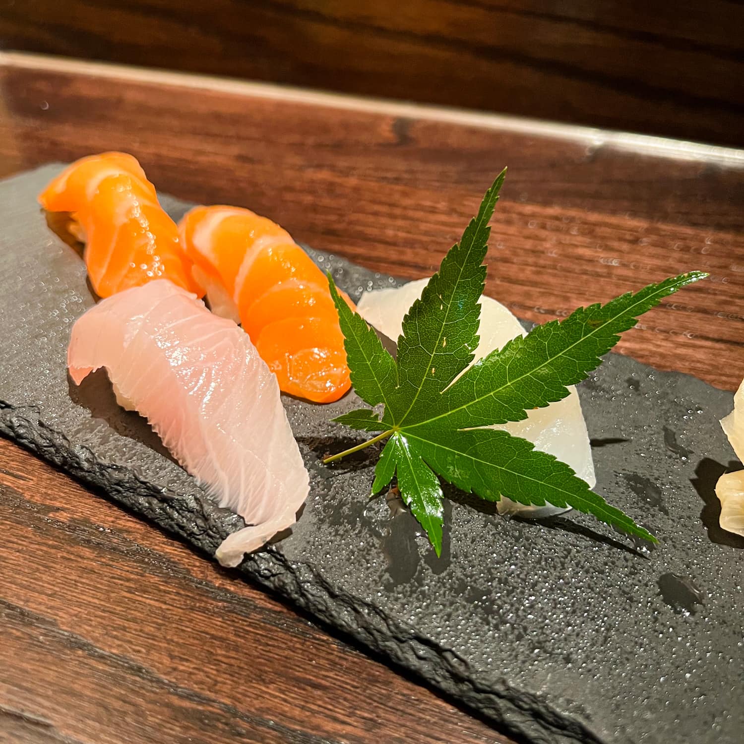 Salmon, yellowtail, and snapper sushi