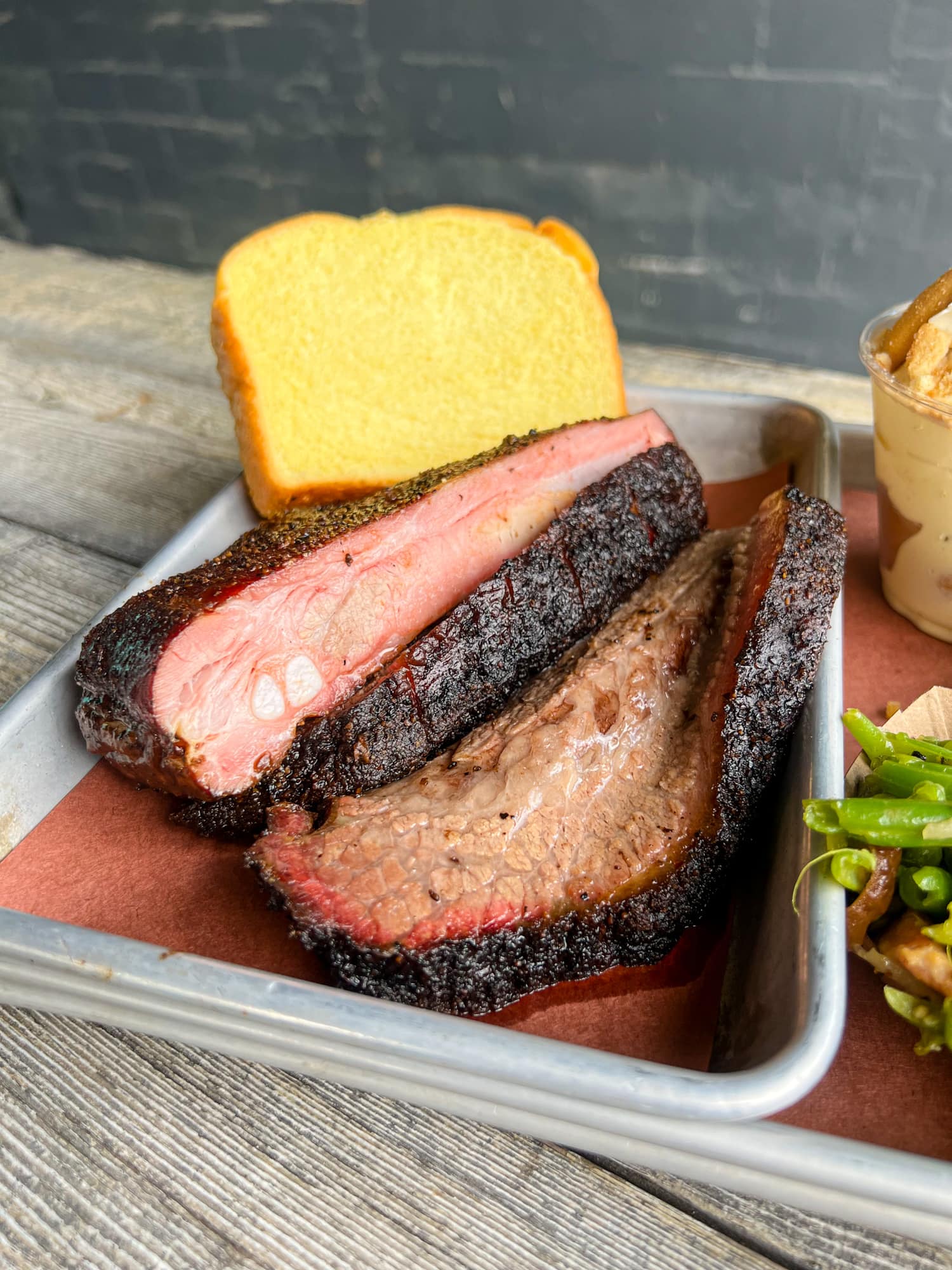 Fatty brisket, pork ribs, and white bread