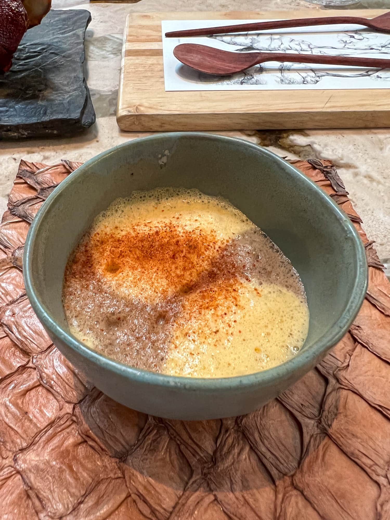 Cecina, arapaima (a type of Amazonian fish), and cassava are served in a bowl at Central Restaurant in Lima, Peru