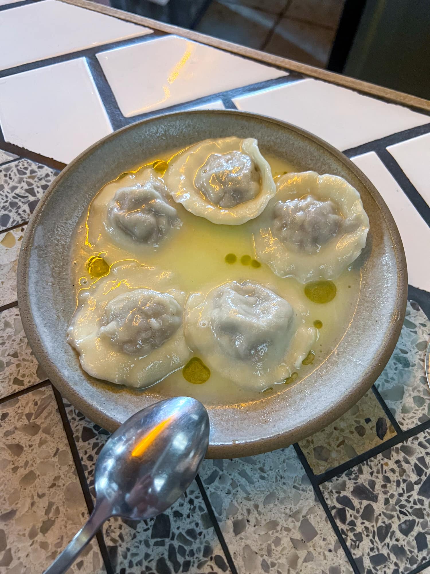 Dumplings with grass-fed beef, Parmigiano-Reggiano, and ricotta at Theodore Rex, one of Houston's best restaurants