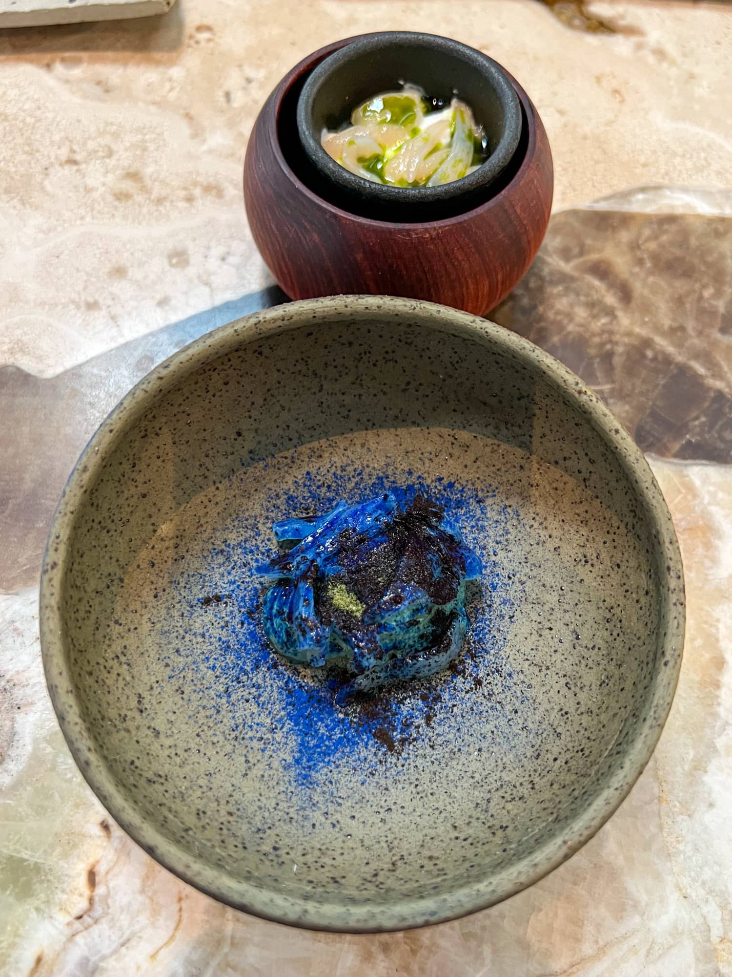 Clams and yuyo seaweed (bottom) and razor clams (top) from 10 meters below sea level