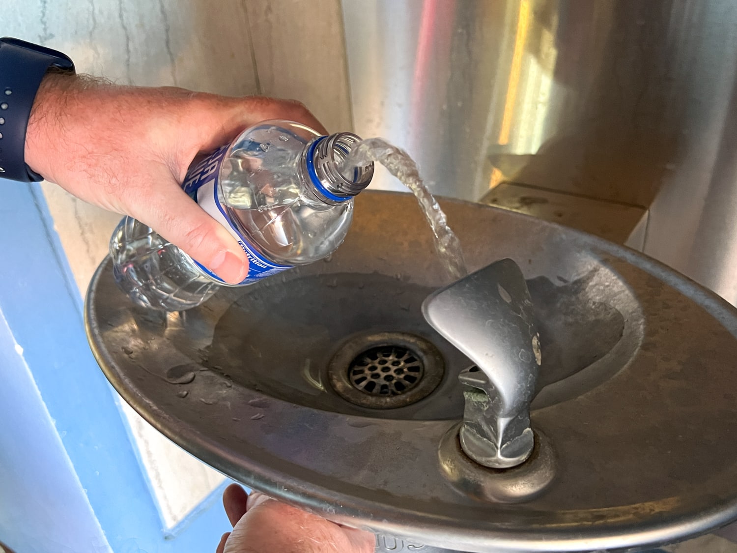 Re-filling our water bottle at the Coliseum fountain