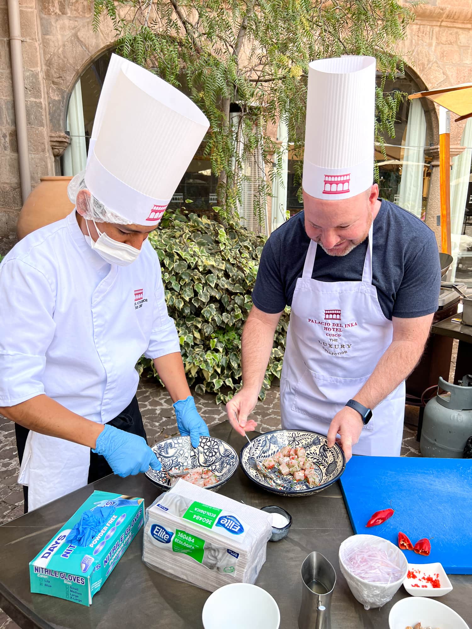 Dave prepping raw fish for the ceviche, our first dish of the cooking class in Cusco, Peru  (photo by Kelly Lemons)