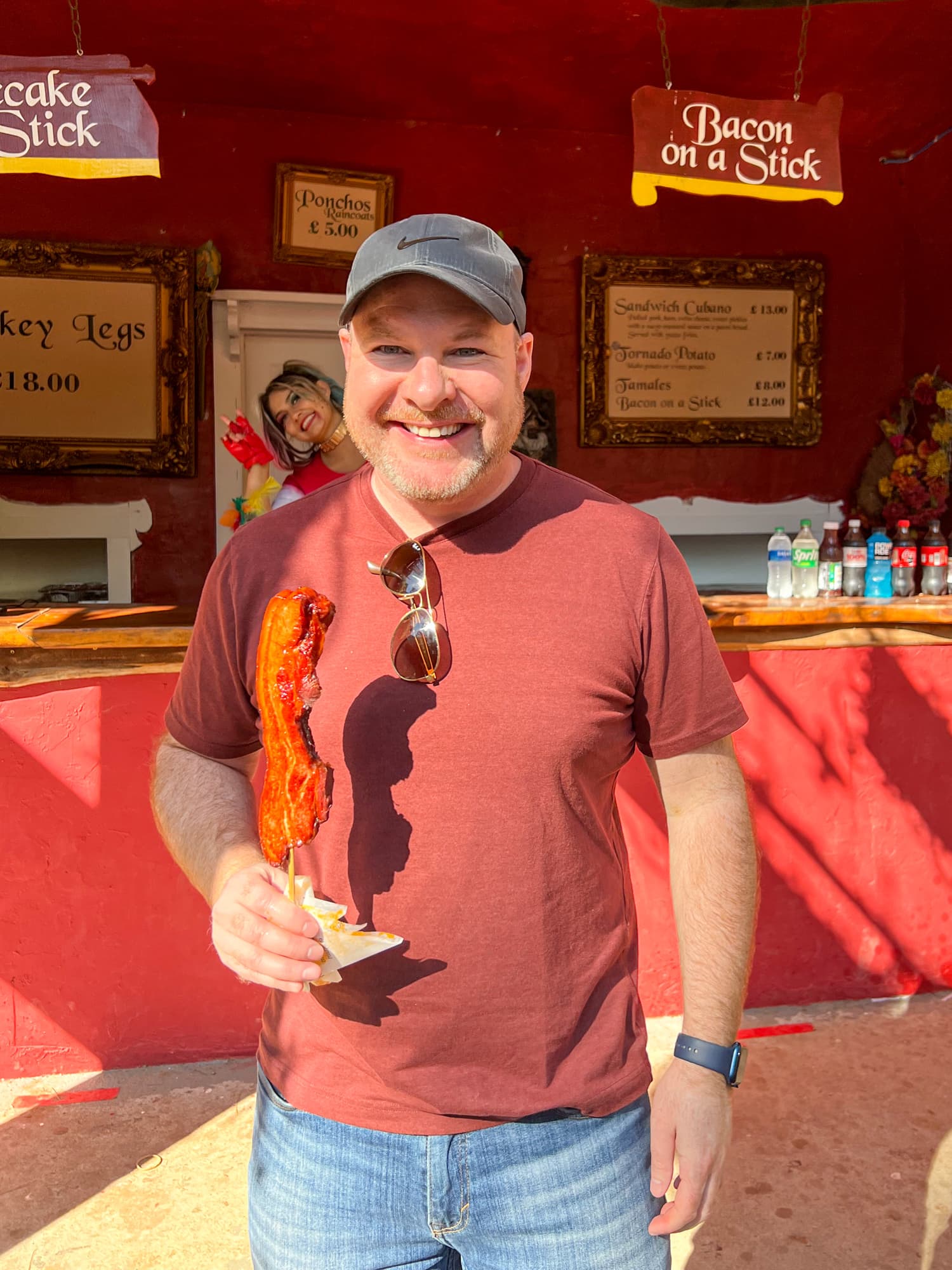 Dave being photobombed with his bacon on a stick (photo by Kelly Lemons)