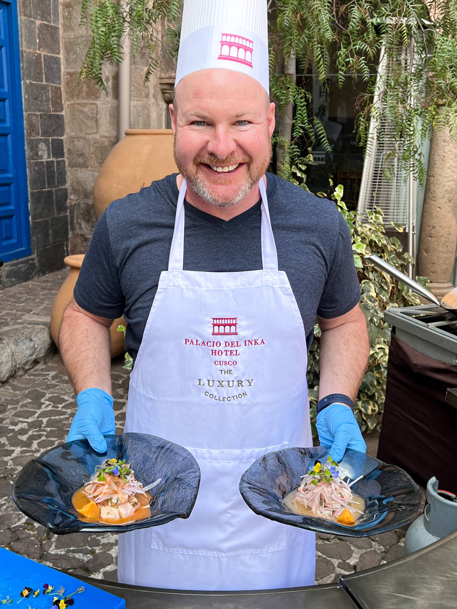 Dave with ceviche dishes (photo by Kelly Lemons)